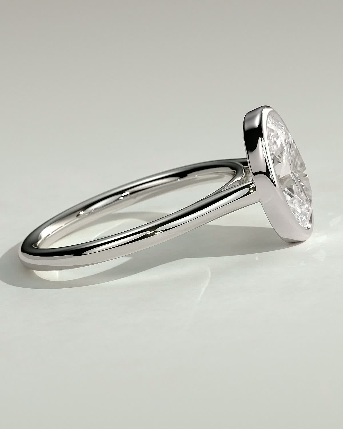 Lexie - Bezel Set Oval with Cathedral Setting - 18k White Gold