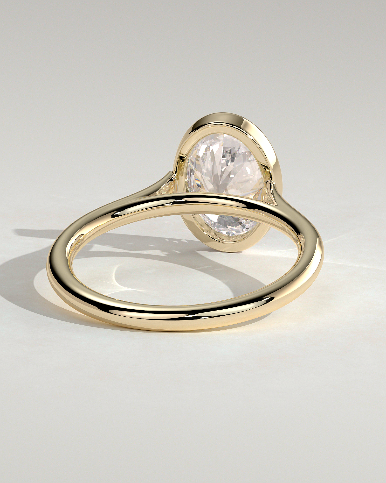 Lexie - Bezel Set Oval with Cathedral Setting - 18k Yellow Gold