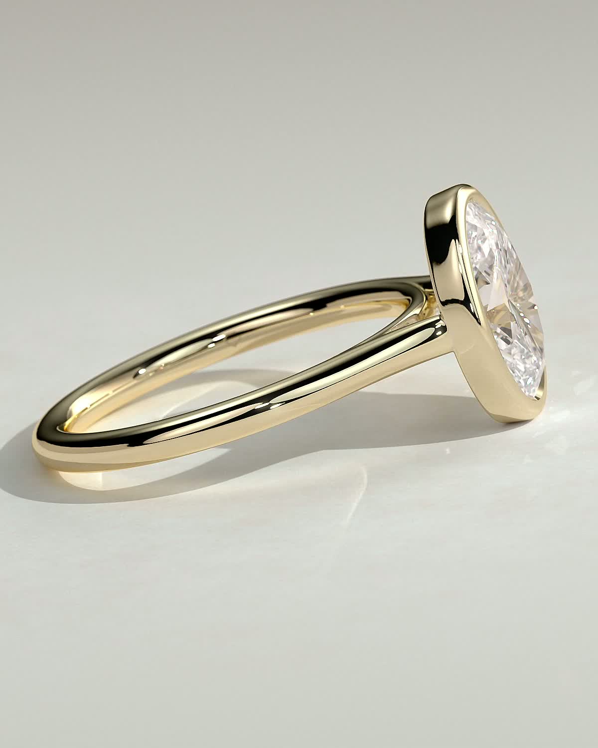Lexie - Bezel Set Oval with Cathedral Setting - 18k Yellow Gold