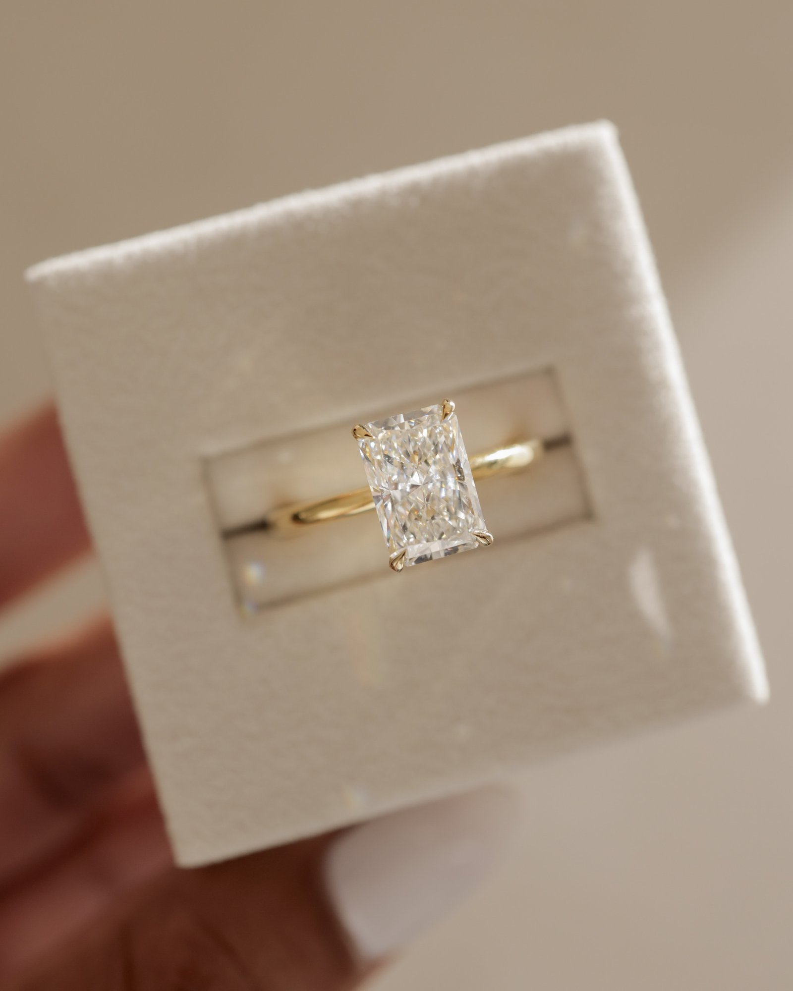 Liberty - Radiant Solitaire with Wrap Around Hidden Halo Lifestyle Image