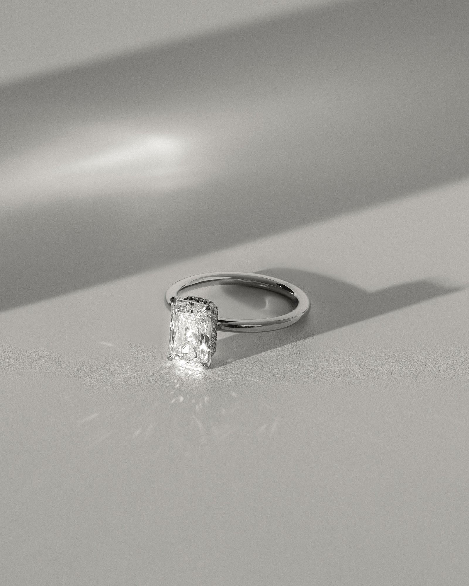 Liberty - Radiant Solitaire with Wrap Around Hidden Halo Lifestyle Image