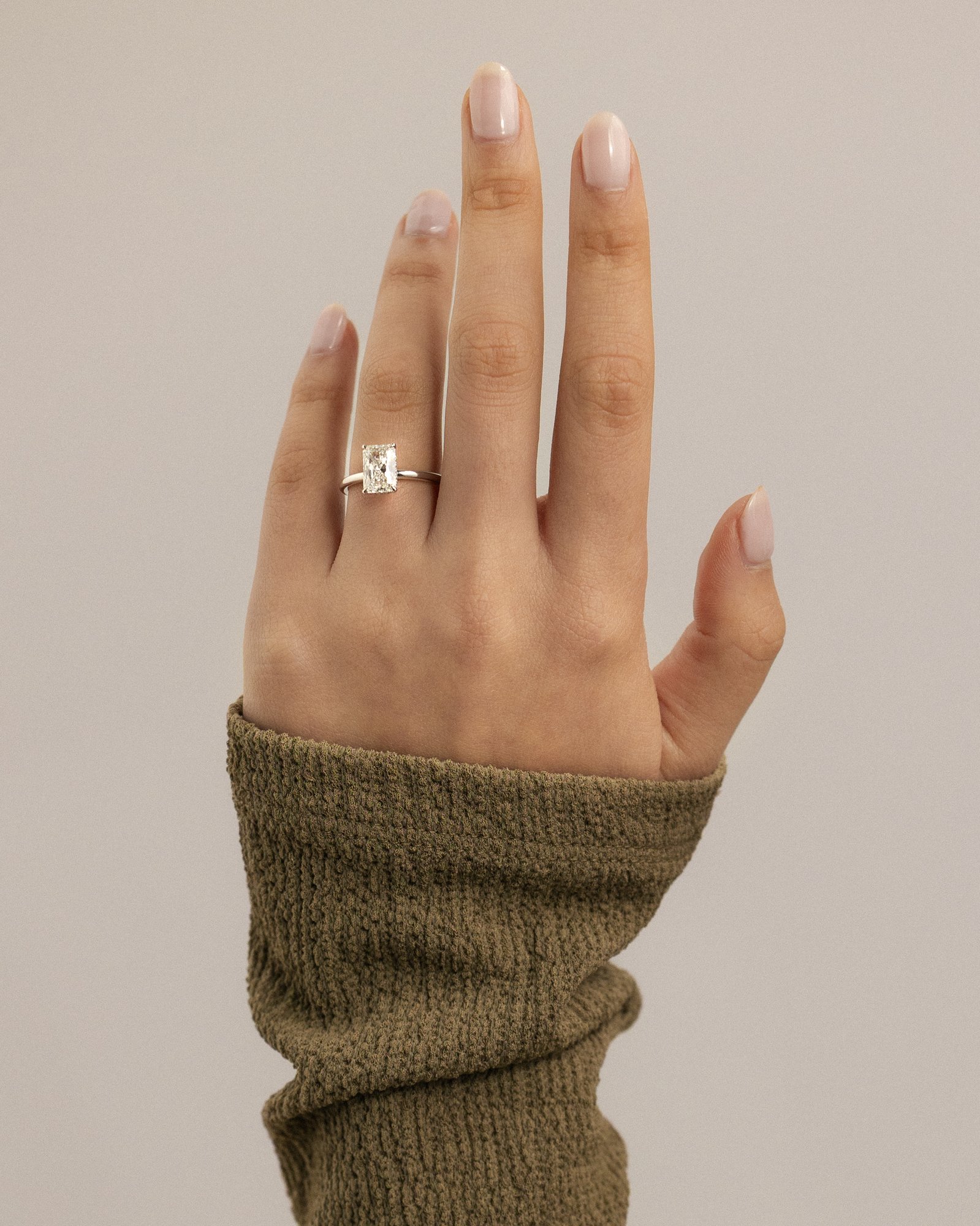 Liberty - Radiant Solitaire with Wrap Around Hidden Halo Lifestyle Image