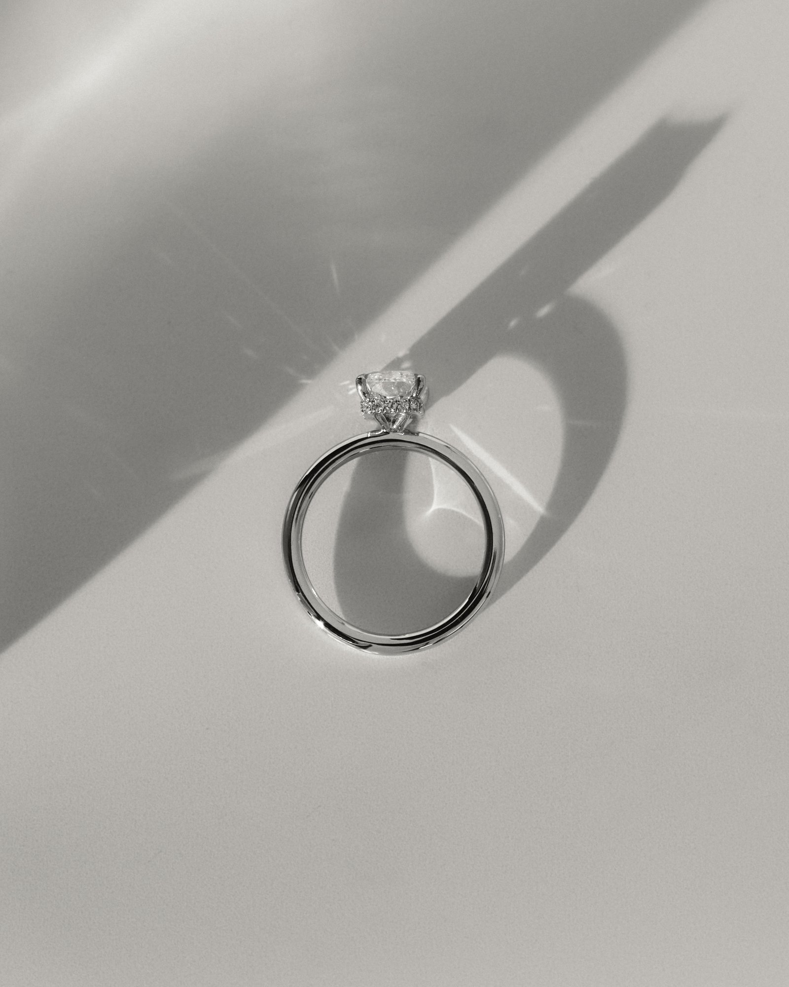 Liberty - Radiant Solitaire with Wrap Around Hidden Halo Lifestyle Image