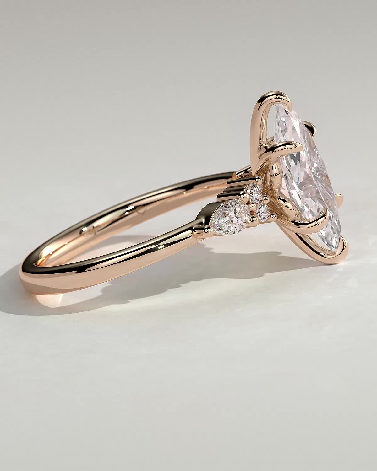 Loretta - Marquise 6 Claw Solitaire with Pear Accents and Round Shoulder Stones Engagement Ring - 18k Rose Gold High Setting
