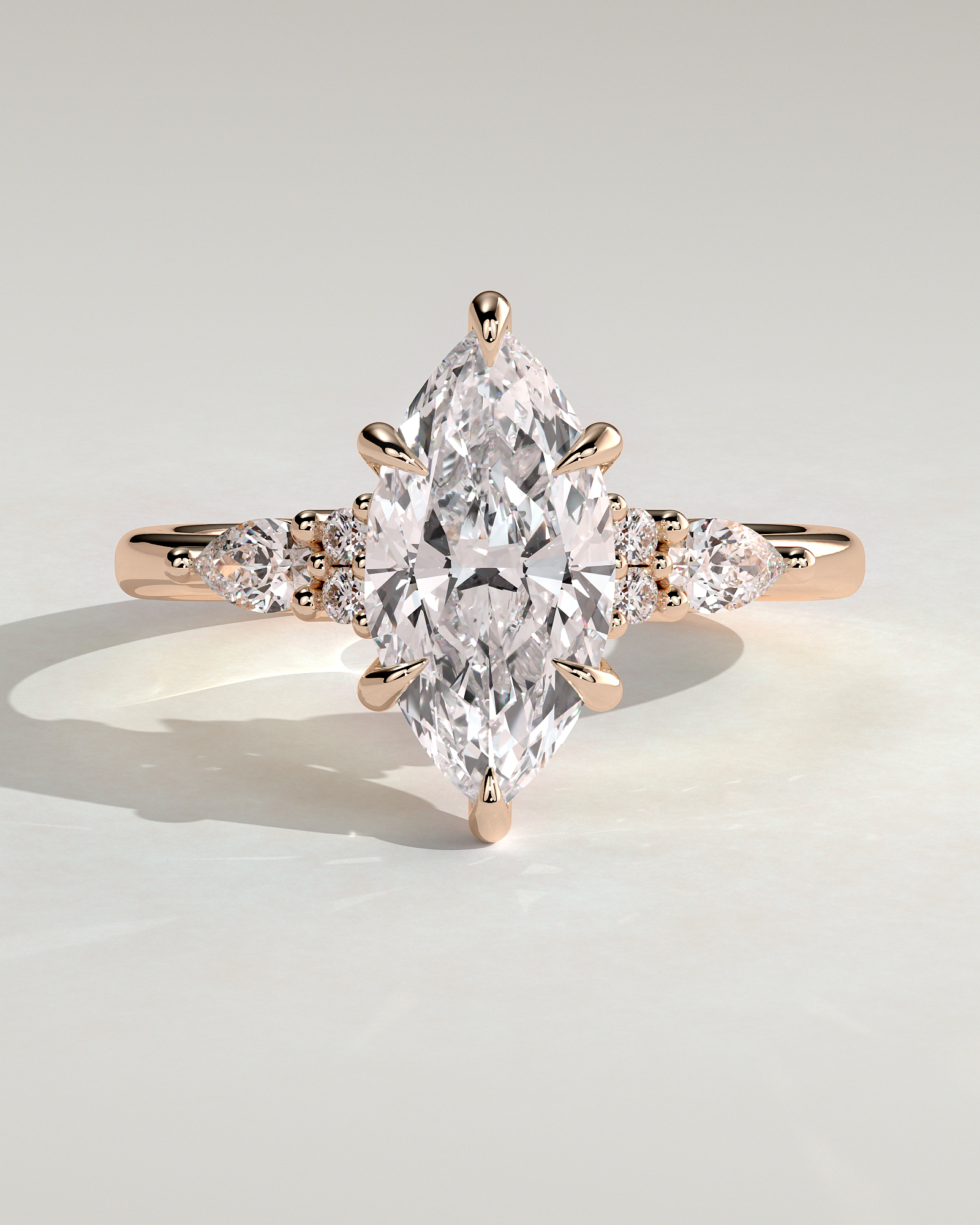 Loretta - Marquise 6 Claw Solitaire with Pear Accents and Round Shoulder Stones Engagement Ring - 18k Rose Gold High Setting