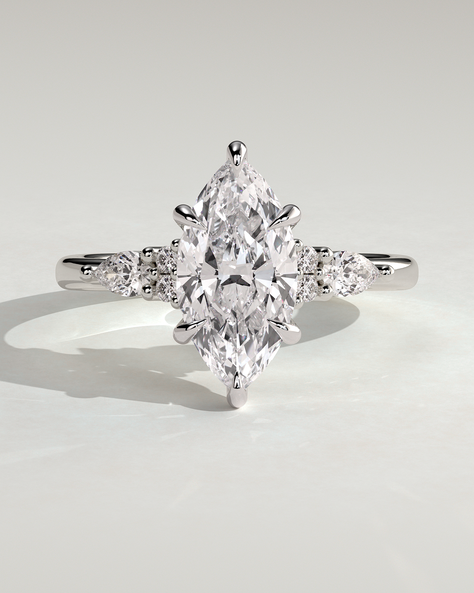 Loretta - Marquise 6 Claw Solitaire with Pear Accents and Round Shoulder Stones Engagement Ring - 18k White Gold High Setting