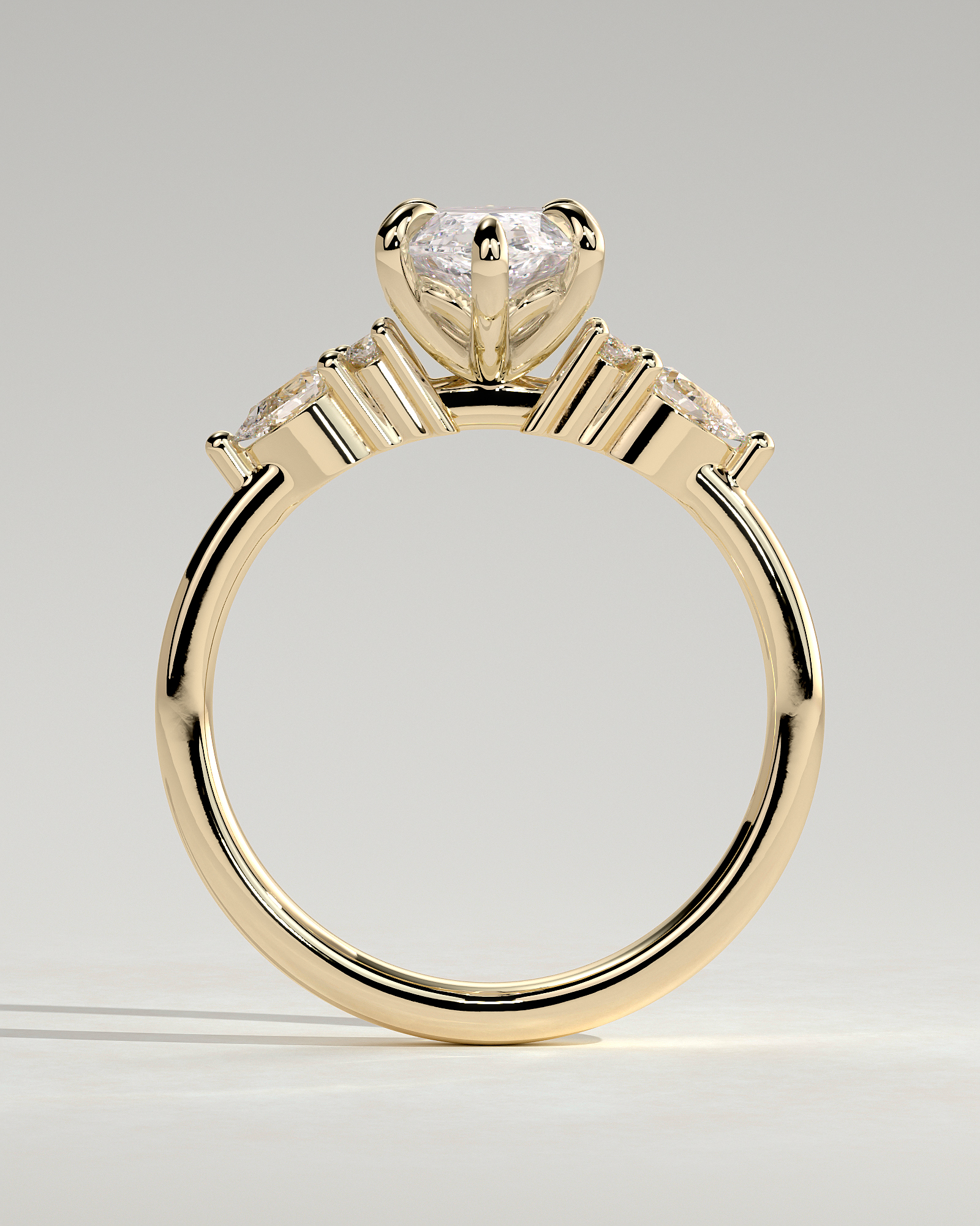 Loretta - Marquise 6 Claw Solitaire with Pear Accents and Round Shoulder Stones Engagement Ring - 18k Yellow Gold High Setting