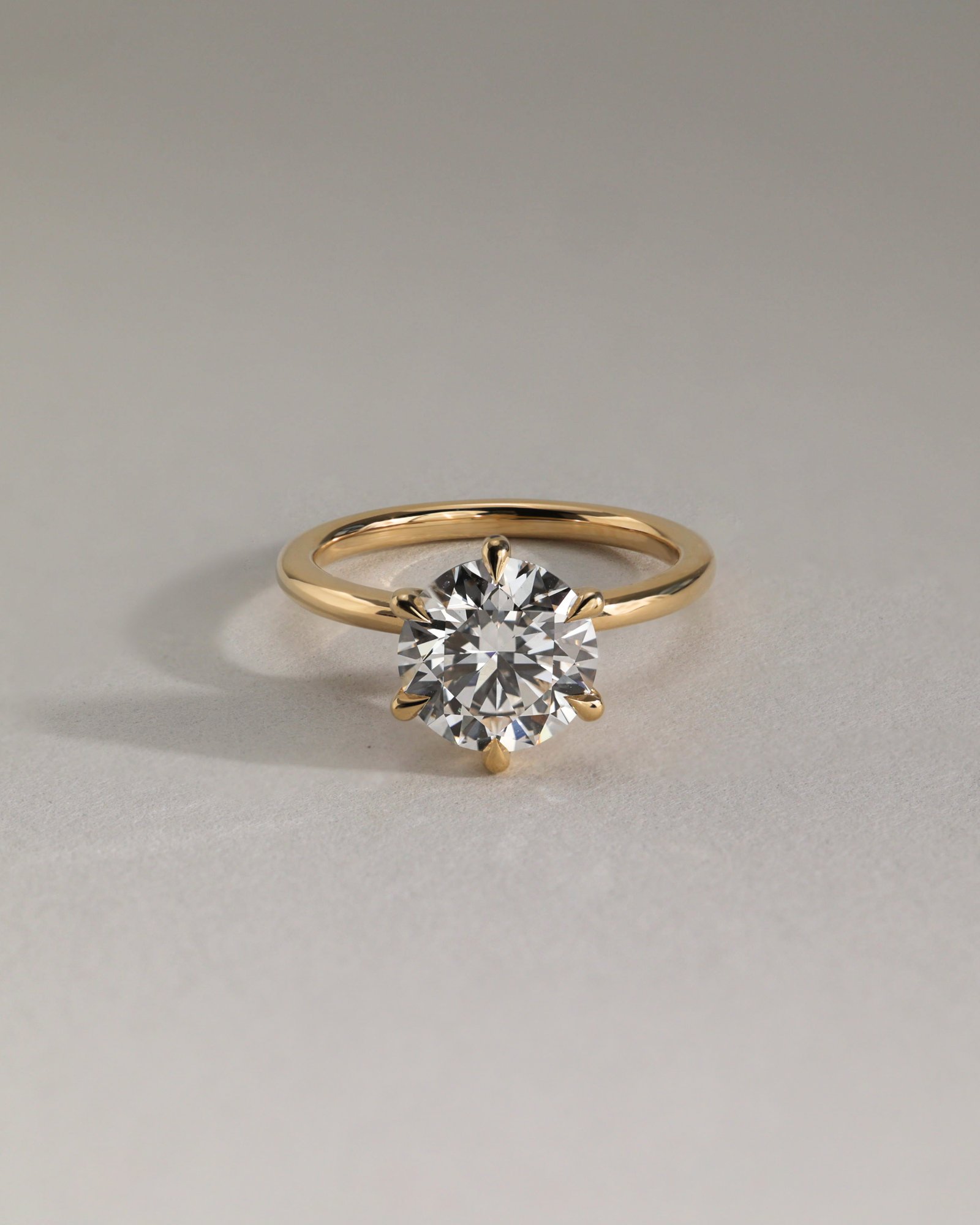 Louise  6 Claw Round Solitaire Lifestyle Image