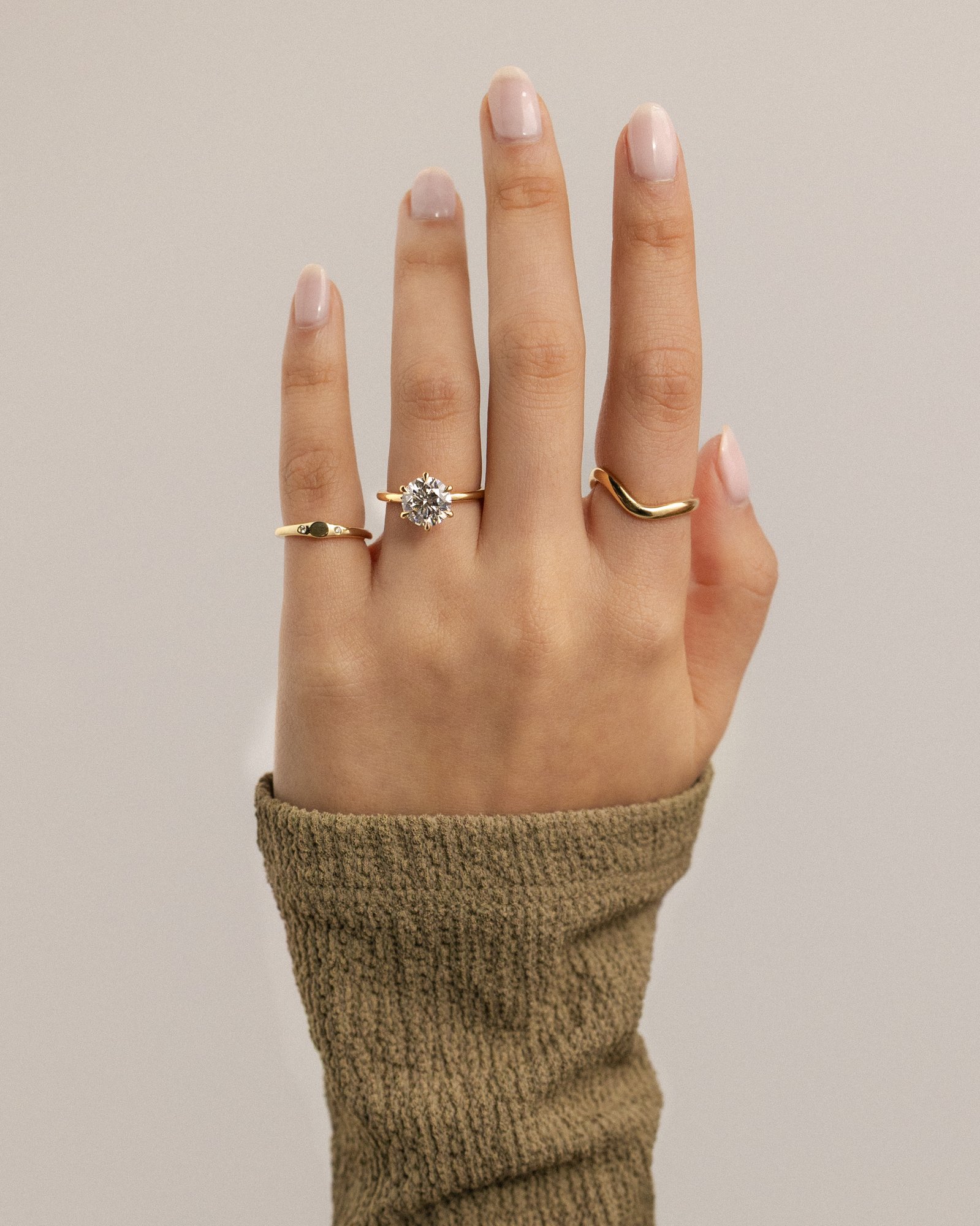 Louise  6 Claw Round Solitaire Lifestyle Image