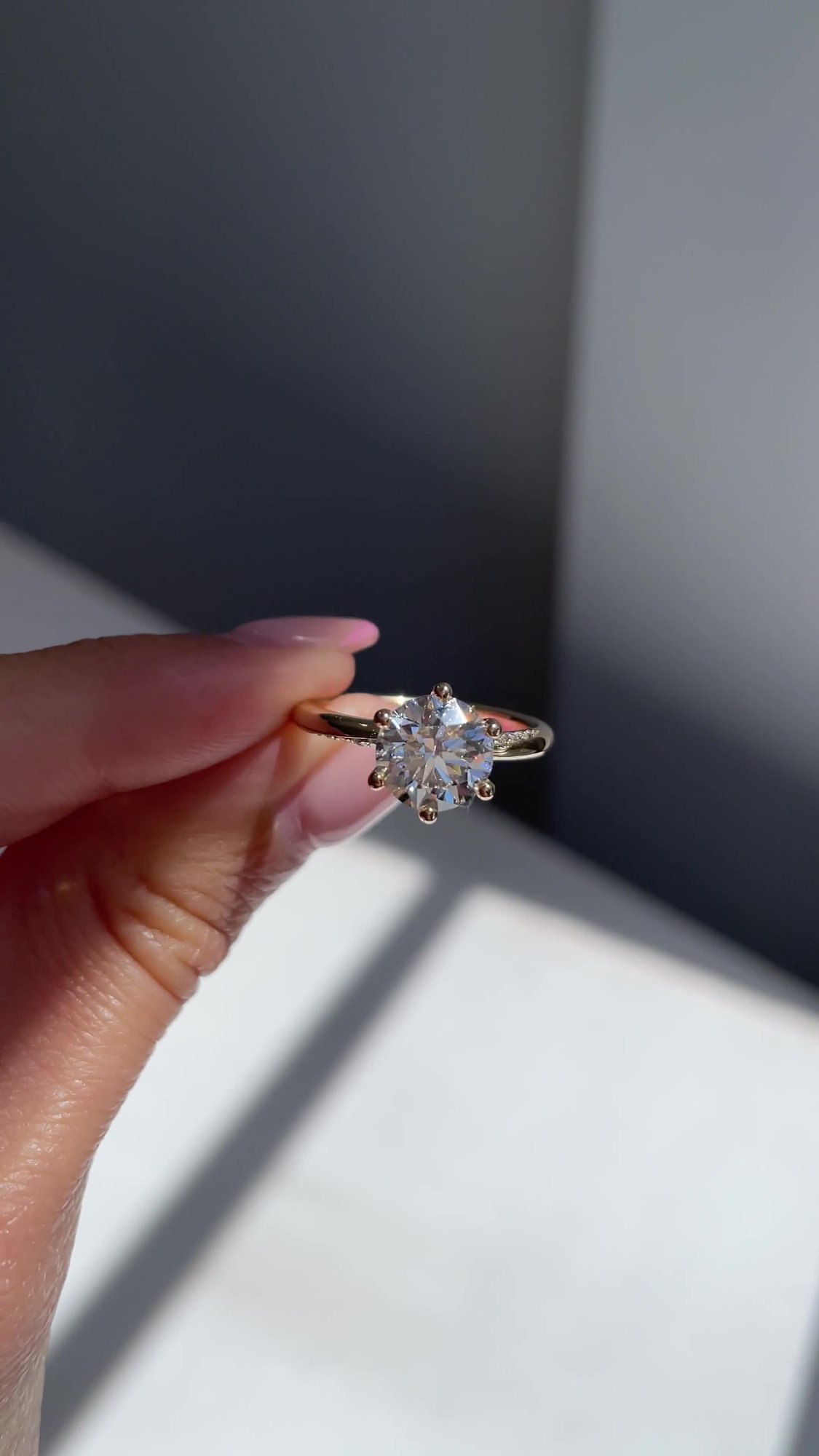 Mahlia - Round Solitaire with Sweeping Micro Pav Lifestyle Image