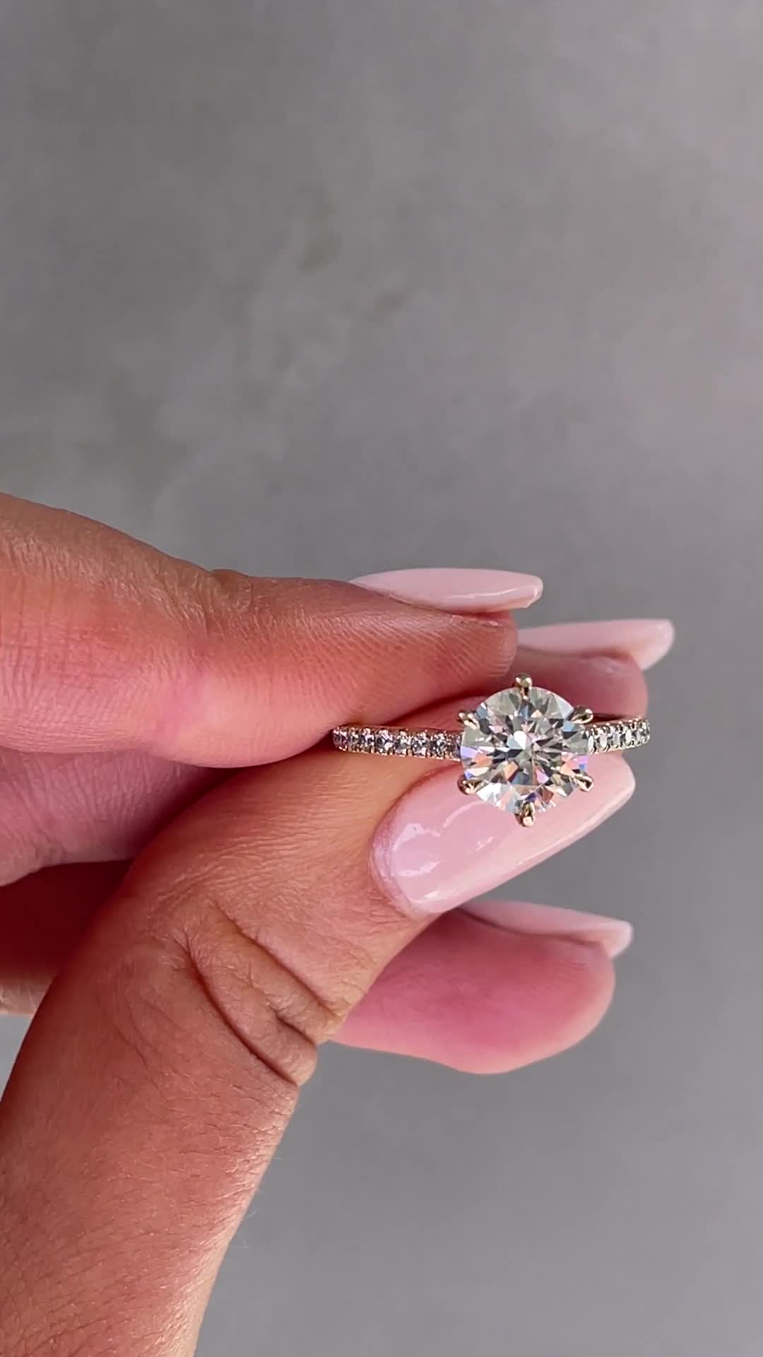 Maisy - 6 Claw Cathedral Round Solitaire with French Pav Lifestyle Image