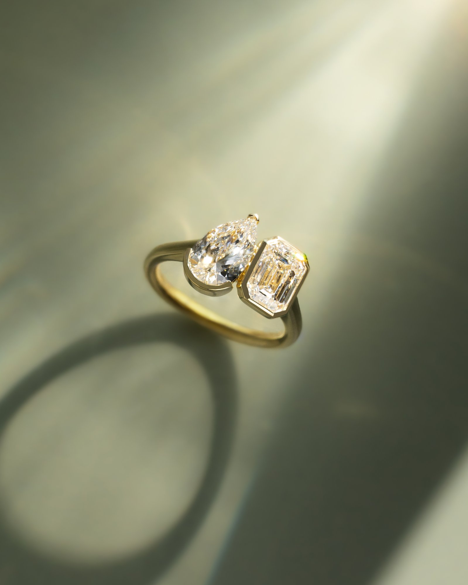 Margot - Bezel Set Pear and Emerald Toi Et Moi Lifestyle Image