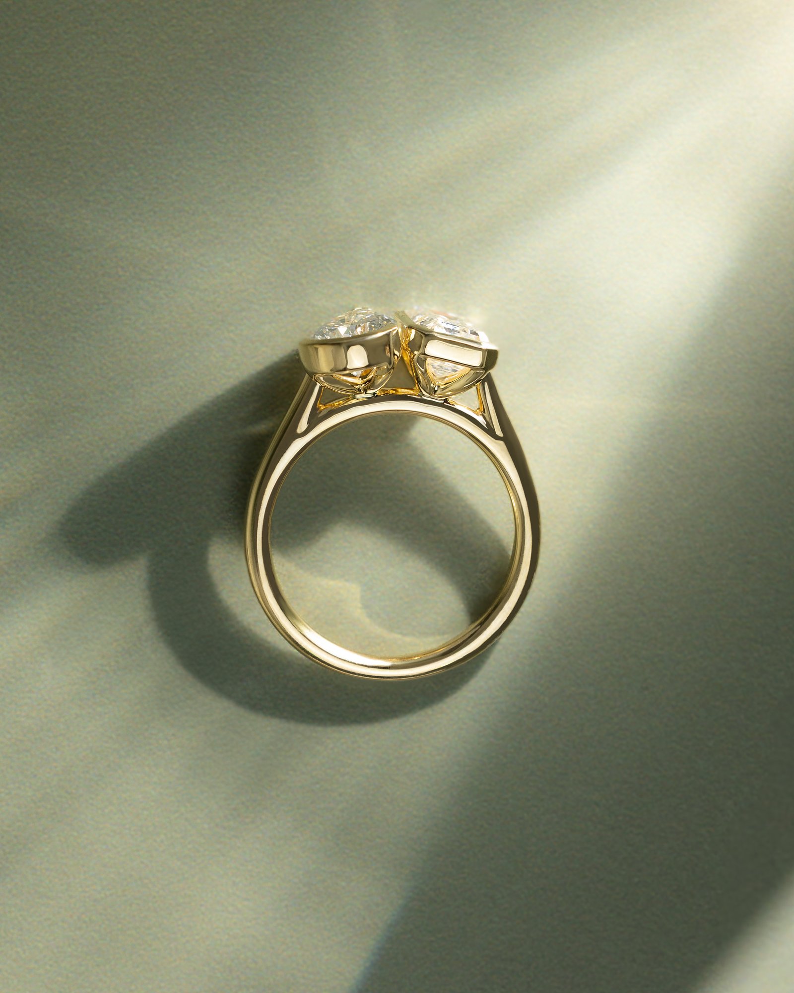 Margot - Bezel Set Pear and Emerald Toi Et Moi Lifestyle Image