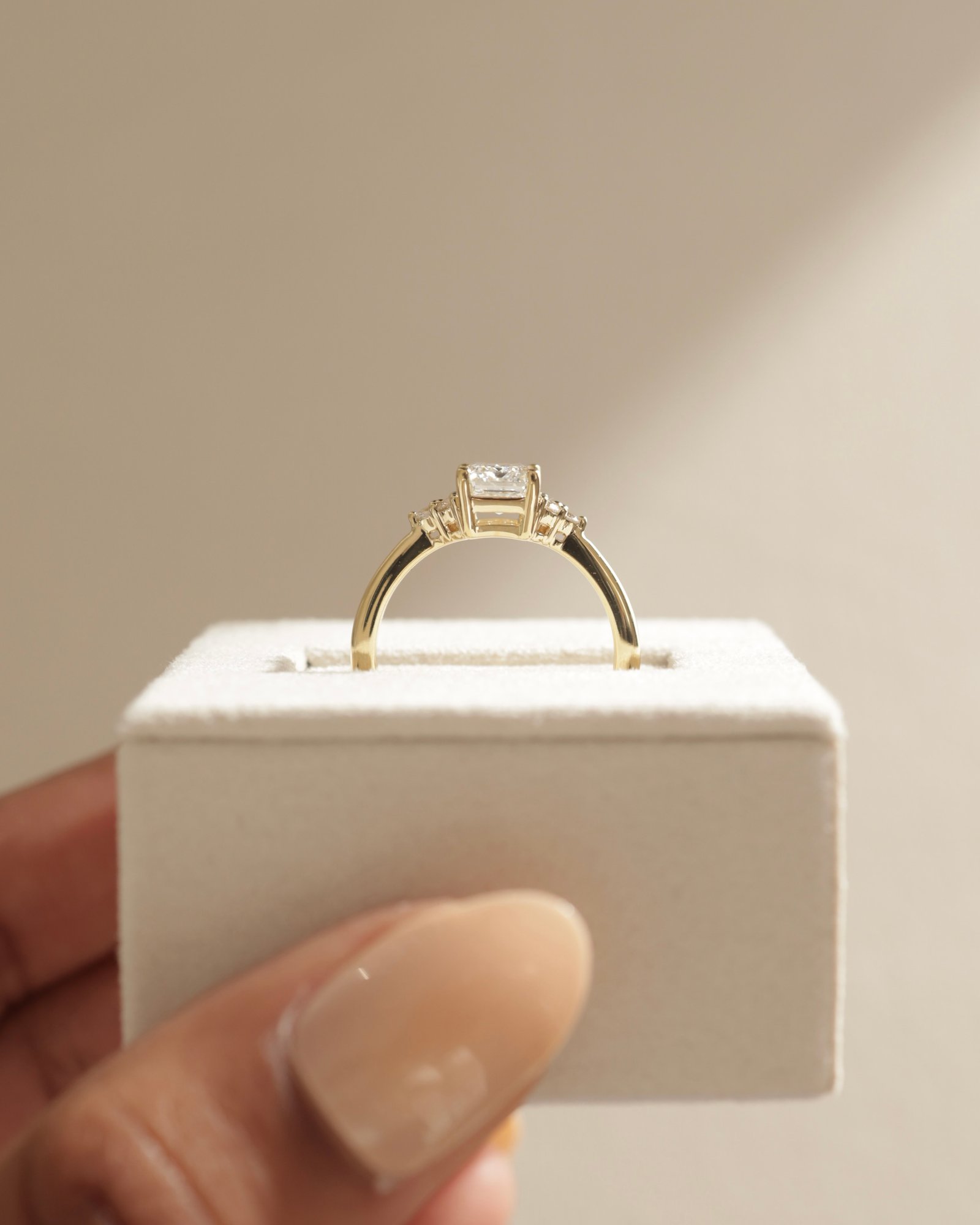 Martina - Emerald with Round Accent Stones Lifestyle Image