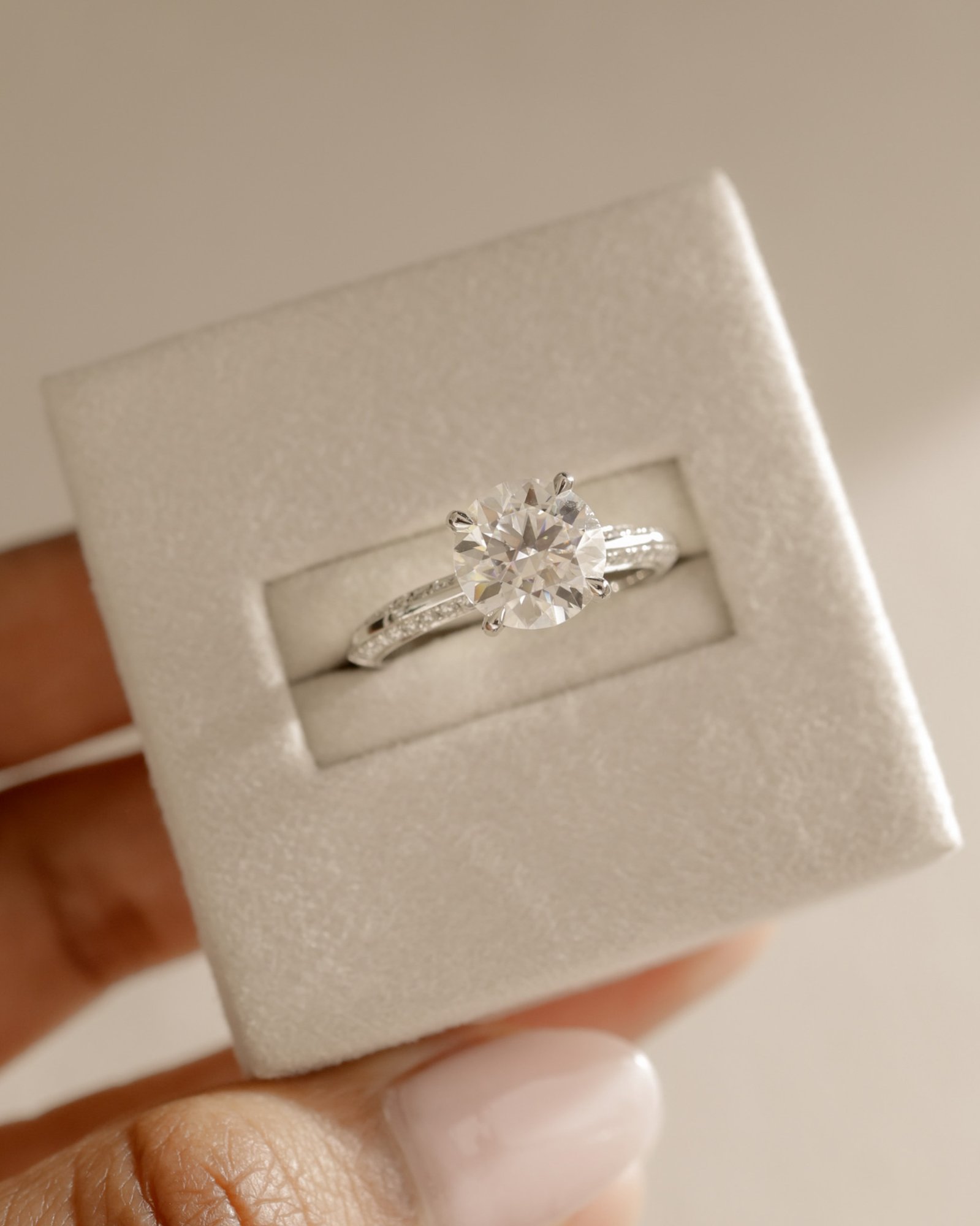 Melinda - 4 Claw Knife Edge Round Solitaire with Hidden Halo and Pav Lifestyle Image