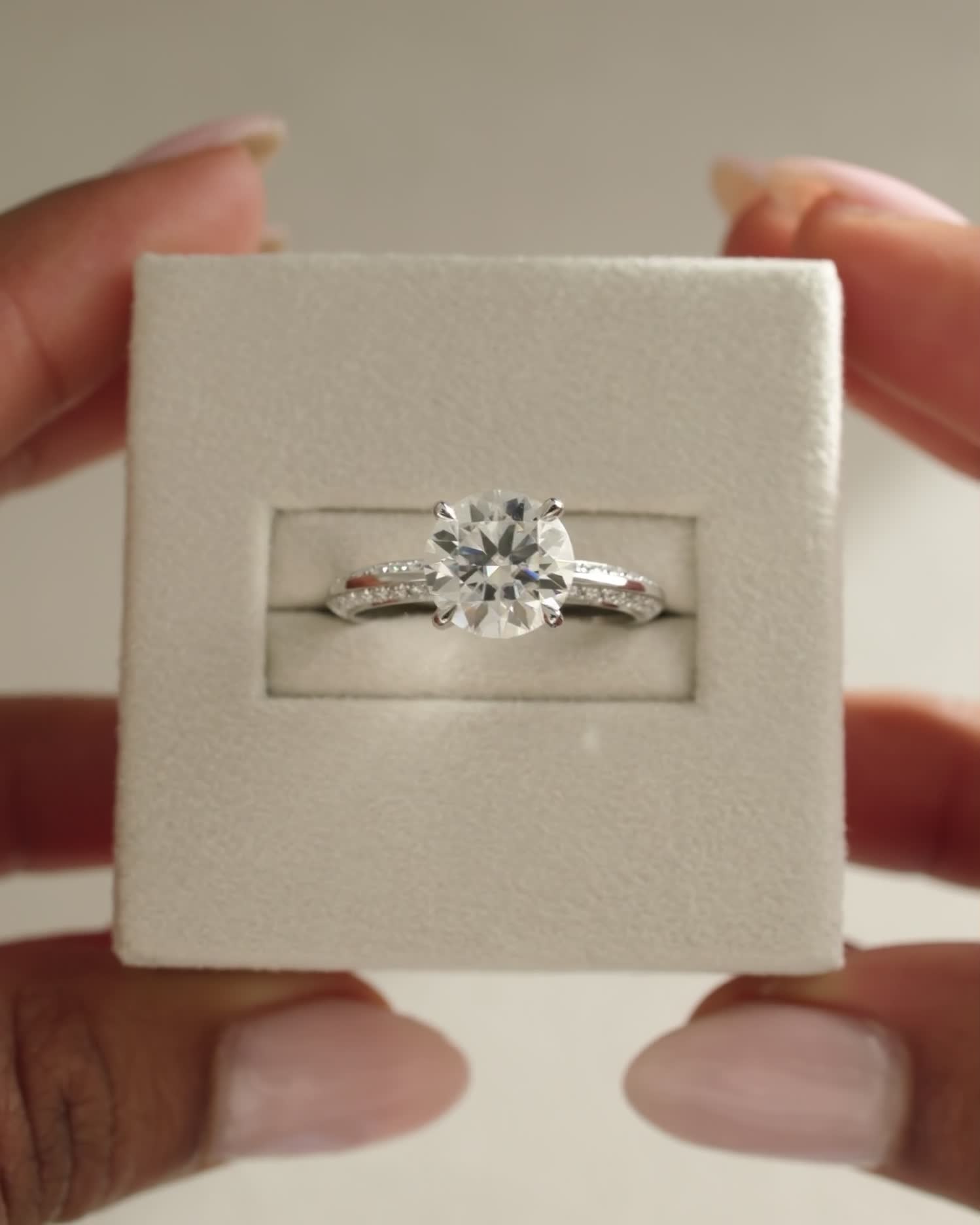 Melinda - 4 Claw Knife Edge Round Solitaire with Hidden Halo and Pav Lifestyle Image