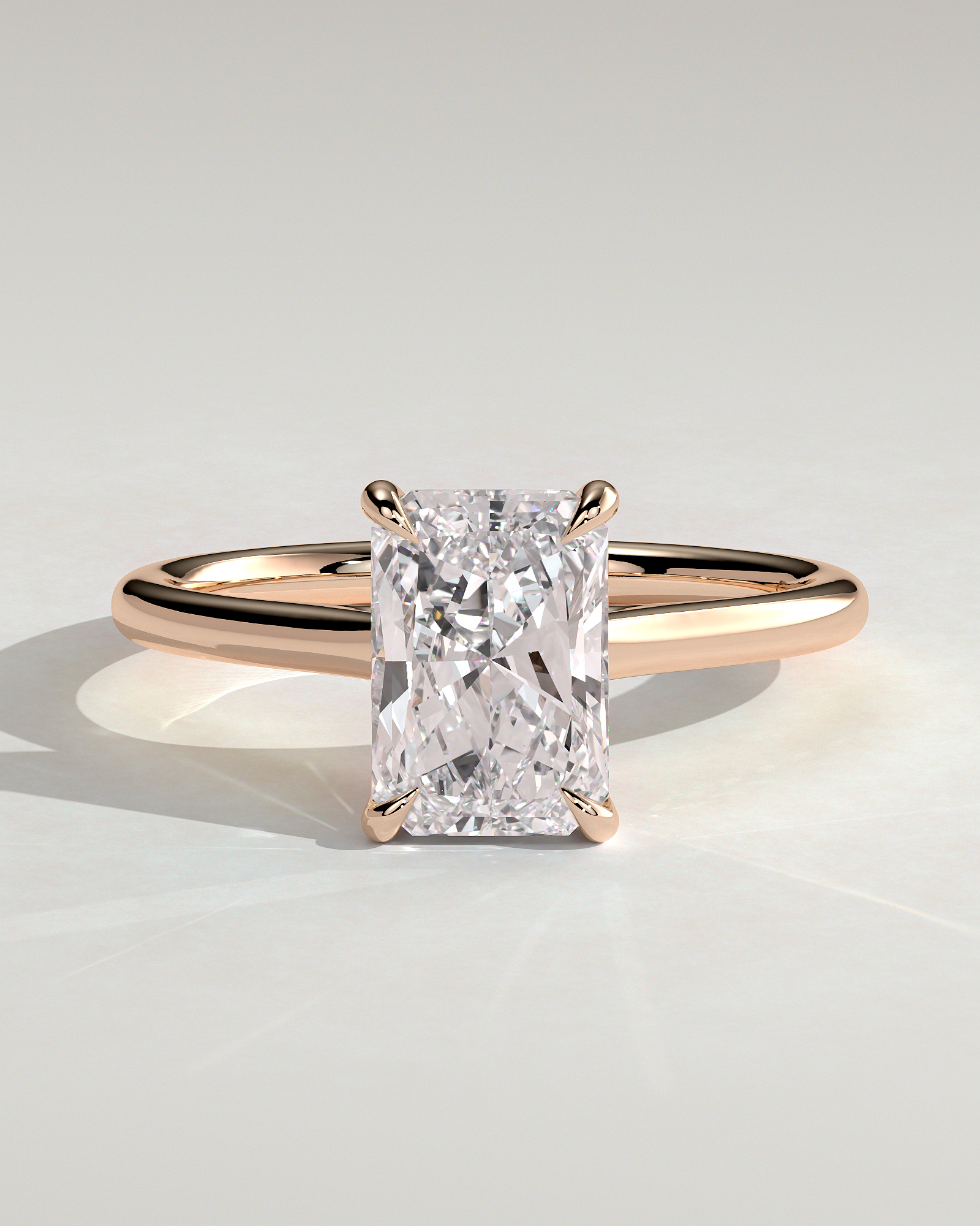 Jane - Emerald Solitaire with Hidden Halo and Cathedral Setting - 18k Rose Gold