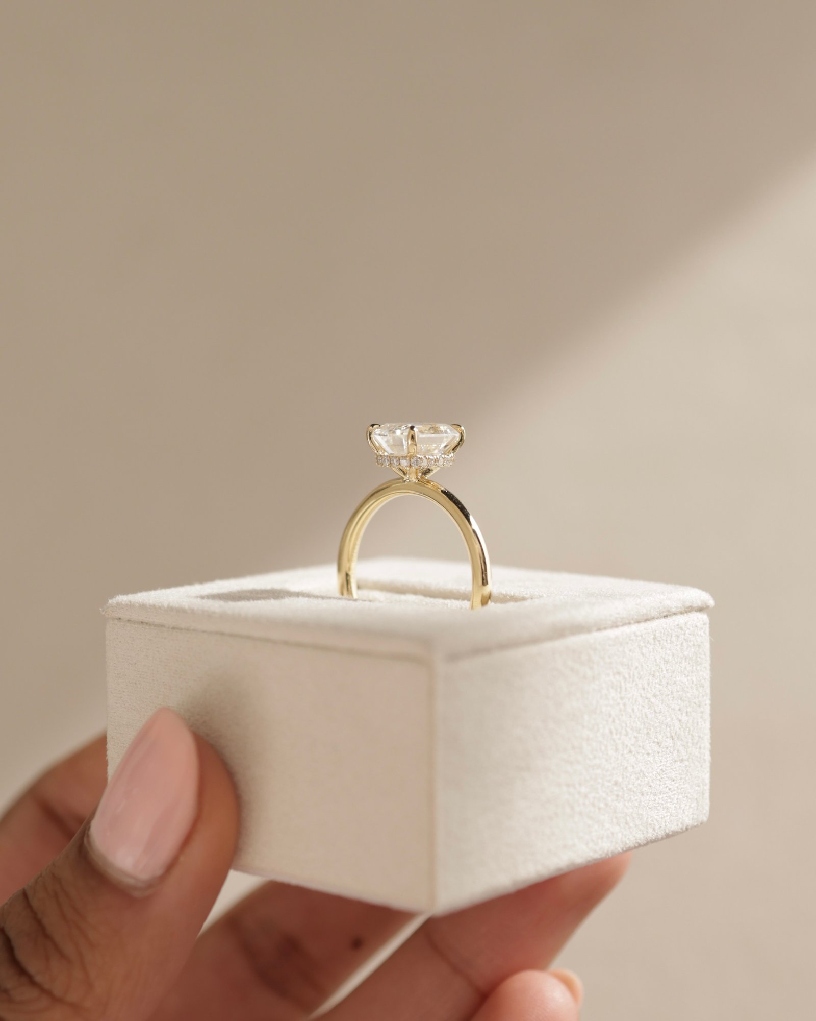 Miller - Emerald Solitaire with Hidden Halo Lifestyle Image