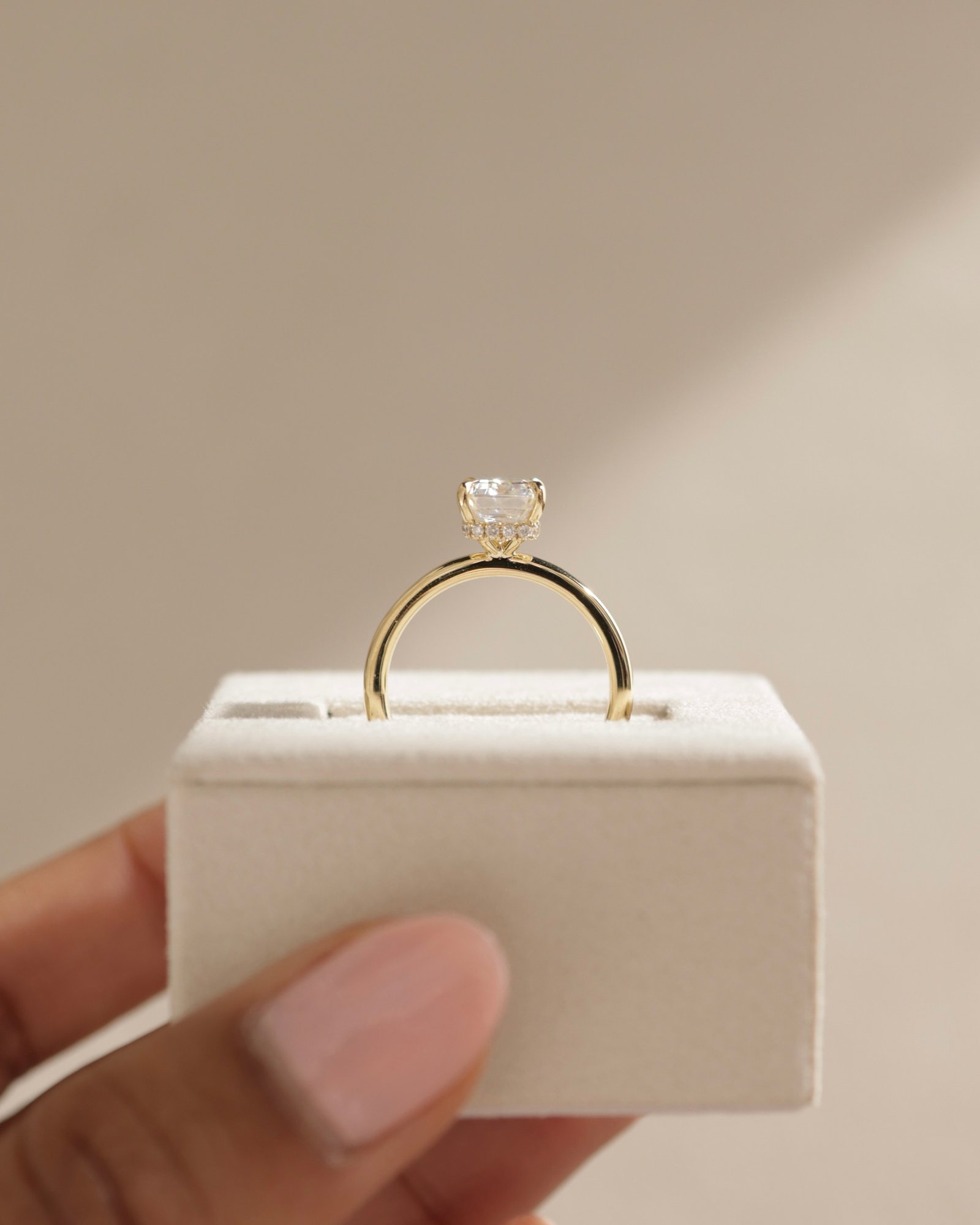 Miller - Emerald Solitaire with Hidden Halo Lifestyle Image