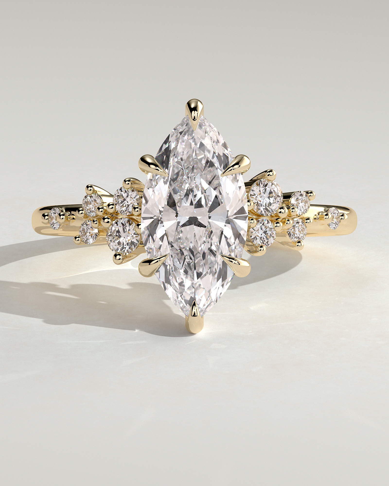 Minnie - Marquise Solitaire with Clustered Round Accent Stones - 18k Yellow Gold