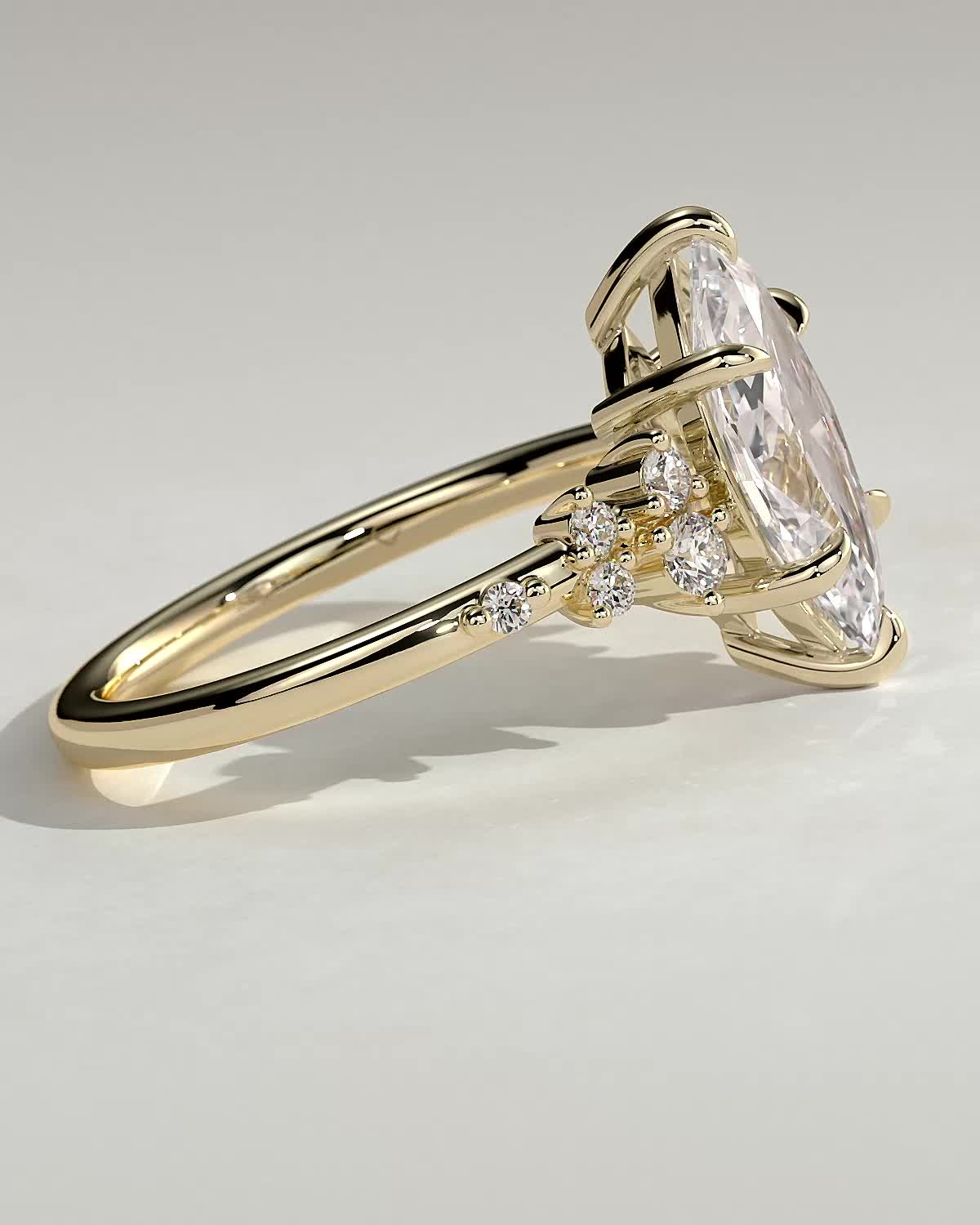 Minnie - Marquise Solitaire with Clustered Round Accent Stones - 18k Yellow Gold