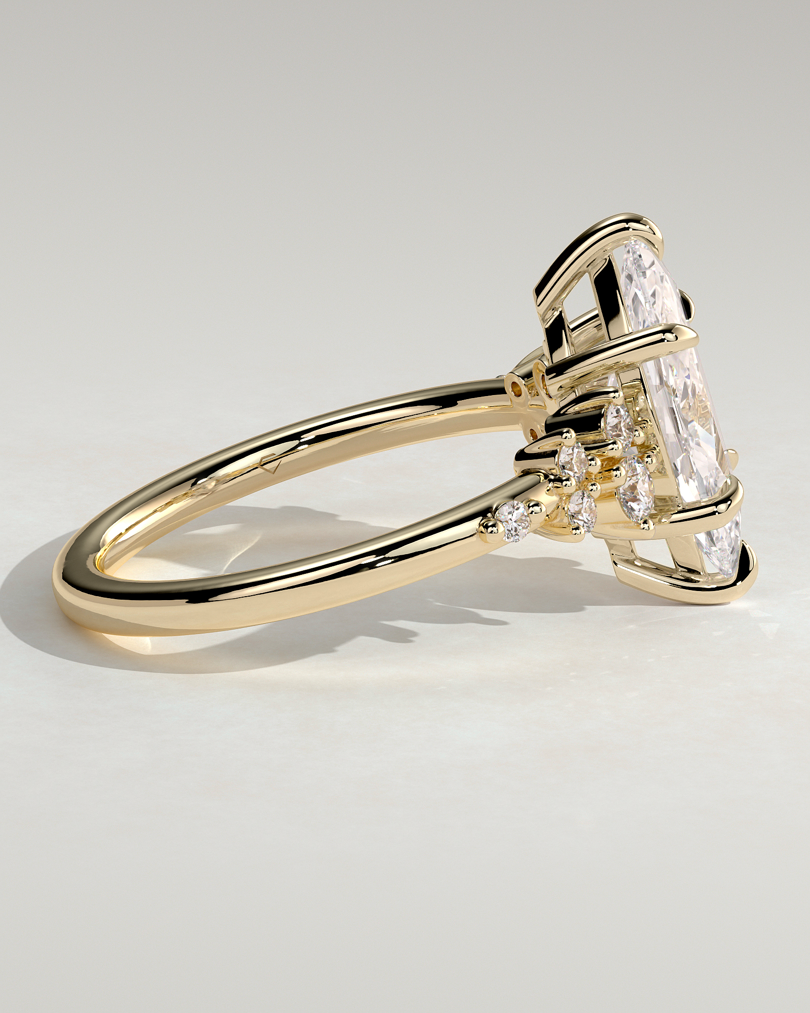 Minnie - Marquise Solitaire with Clustered Round Accent Stones - 18k Yellow Gold