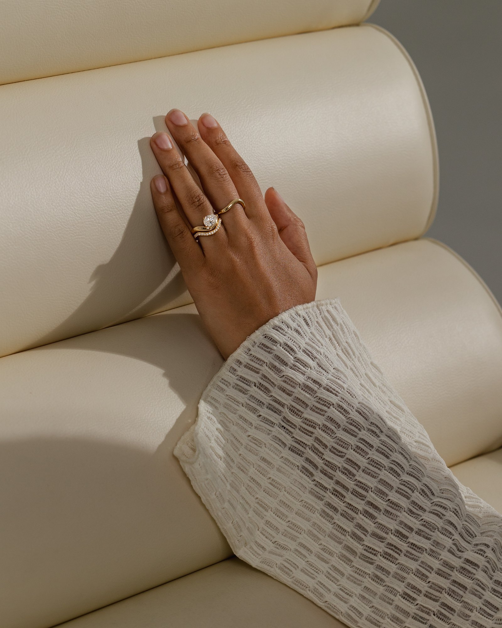 Moana - Bead Set Pav Curved Wedding Band Lifestyle Image