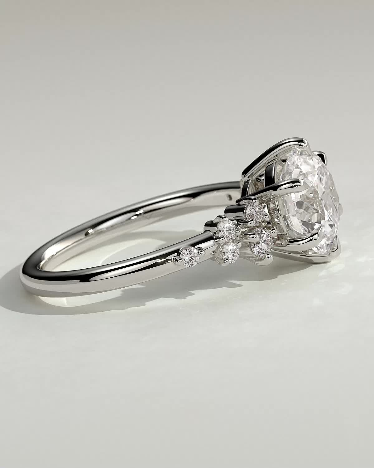 Molly - Round 6 Claw Solitaire with Clustered Round Shoulder Stones Engagement Ring - 18k White Gold