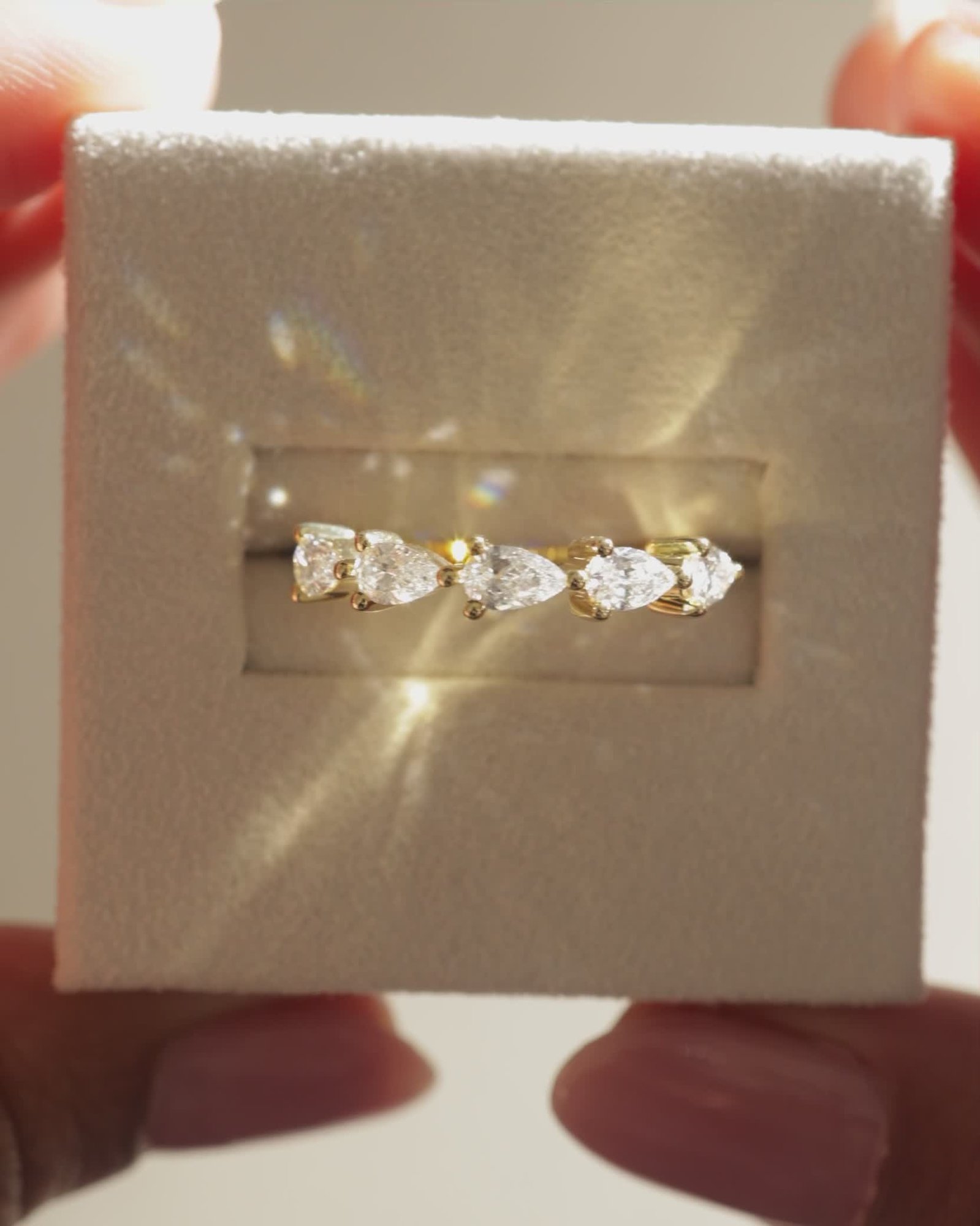 Narissa - 5 Stone East West Pear Wedding Band Lifestyle Image