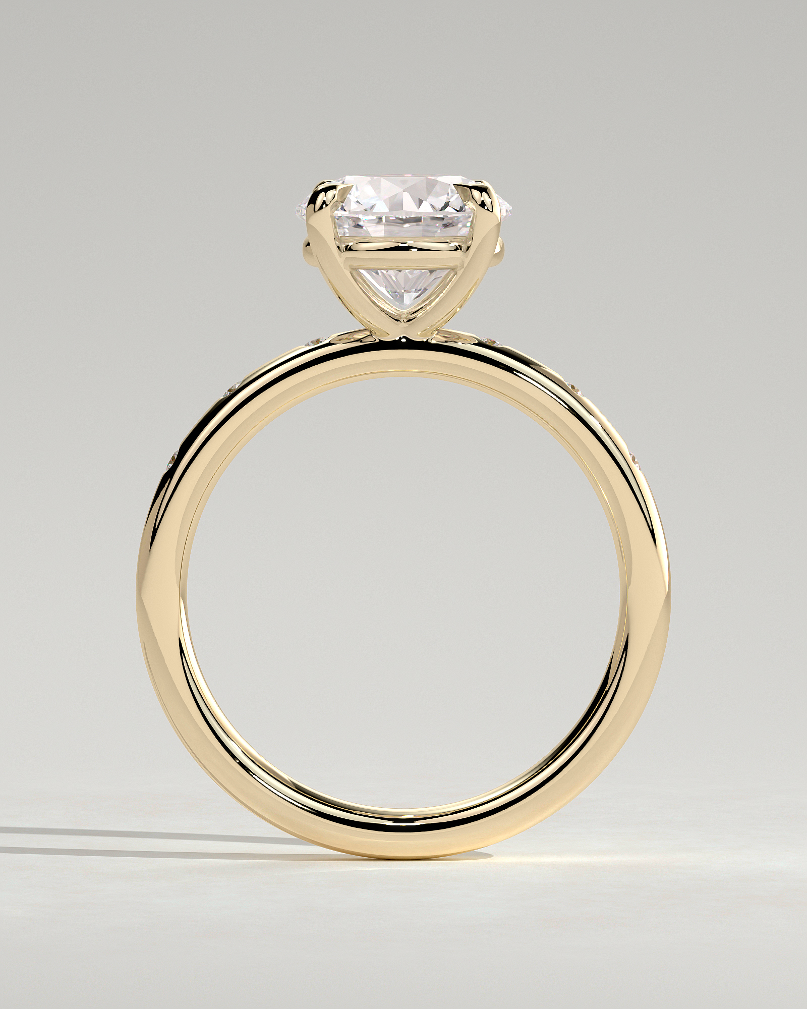Nekija - 4 Claw Round Solitaire with Accent Stones - 18k Yellow Gold