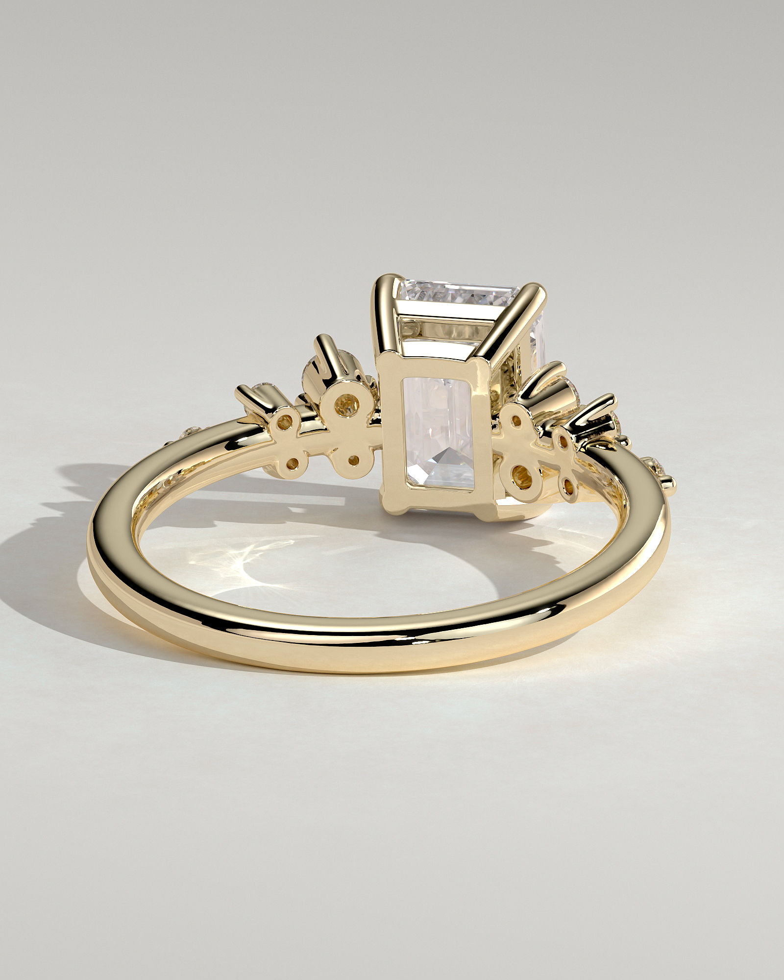 Nellie - Emerald Solitaire with Clustered Round Accent Stones - 18k Yellow Gold