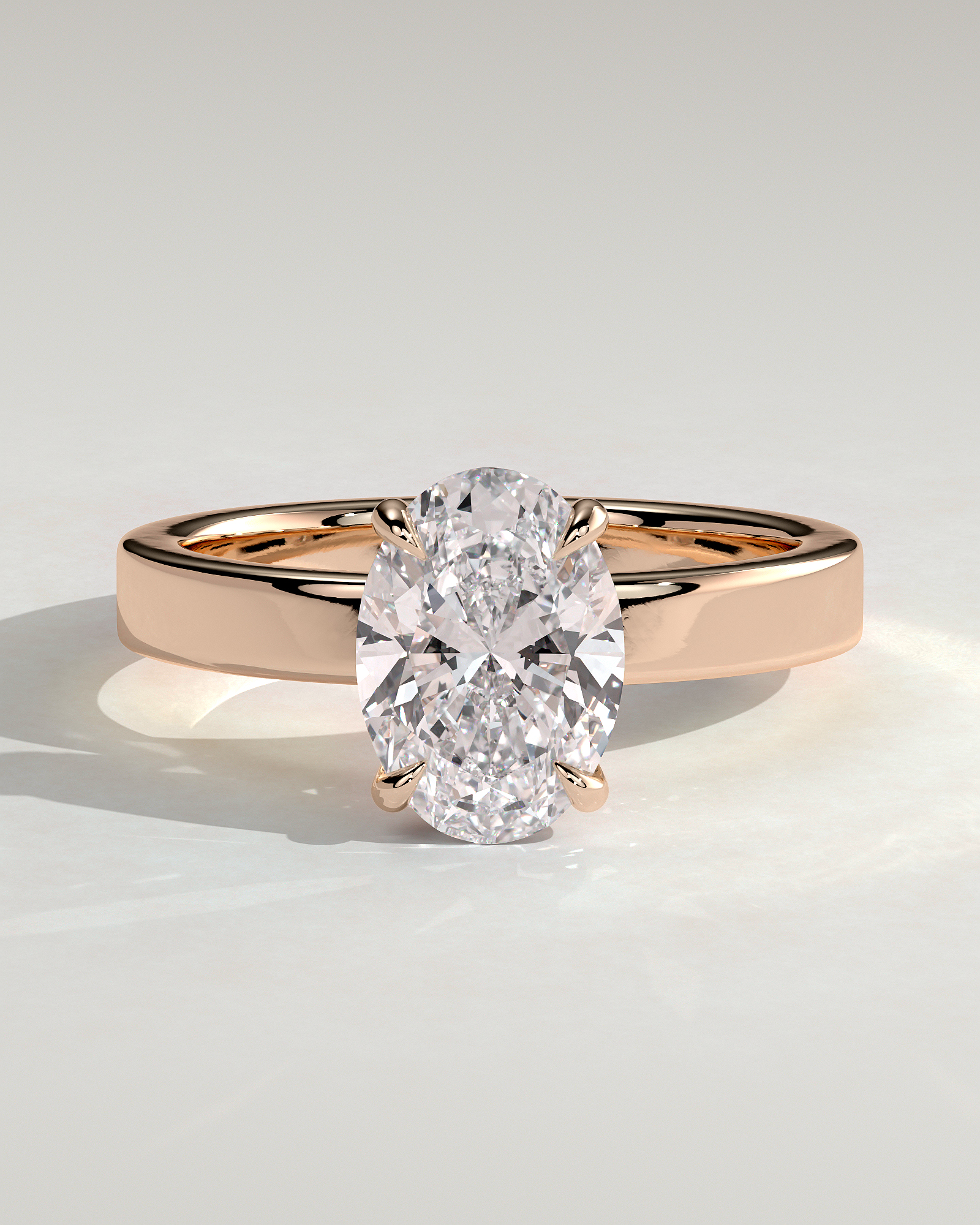 Nikita - Oval 4 Claw Solitaire with Flat Cigar Band and Hidden Halo Engagement Ring - 18k Rose Gold High Setting