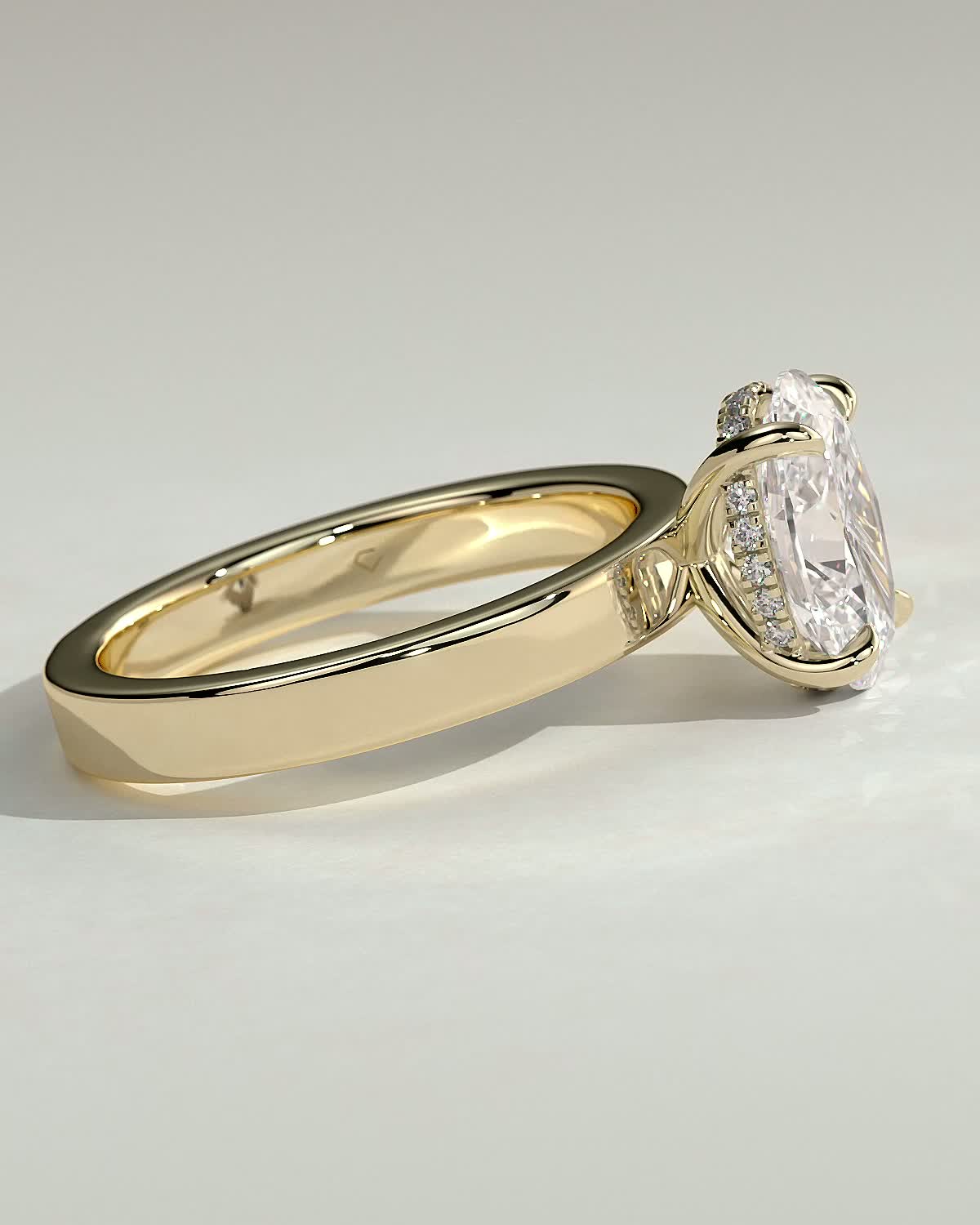 Nikita - Oval 4 Claw Solitaire with Flat Cigar Band and Hidden Halo Engagement Ring - 18k Yellow Gold High Setting