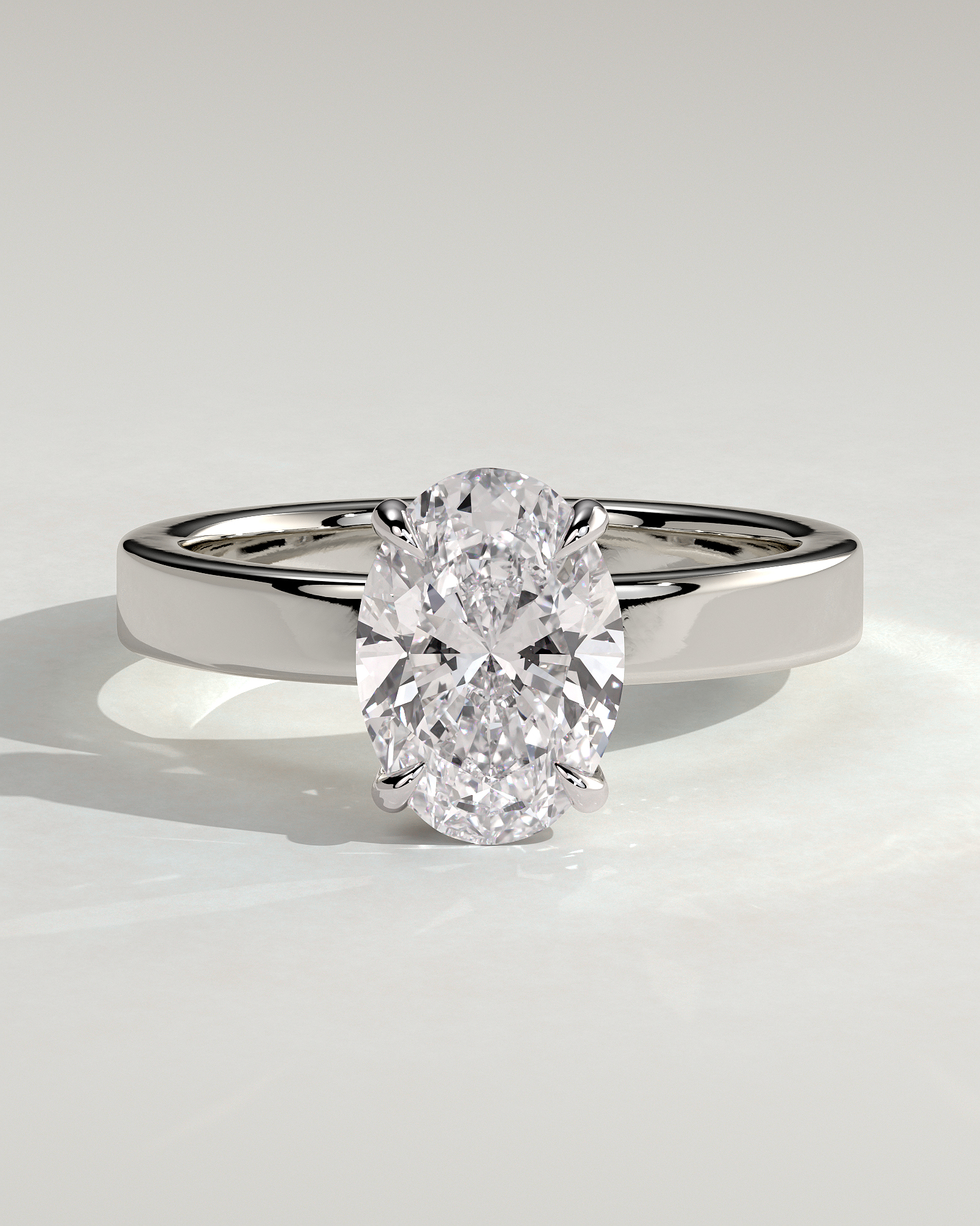 Nikita - Oval Flat Cigar Band Solitaire with Hidden Halo - 18k White Gold