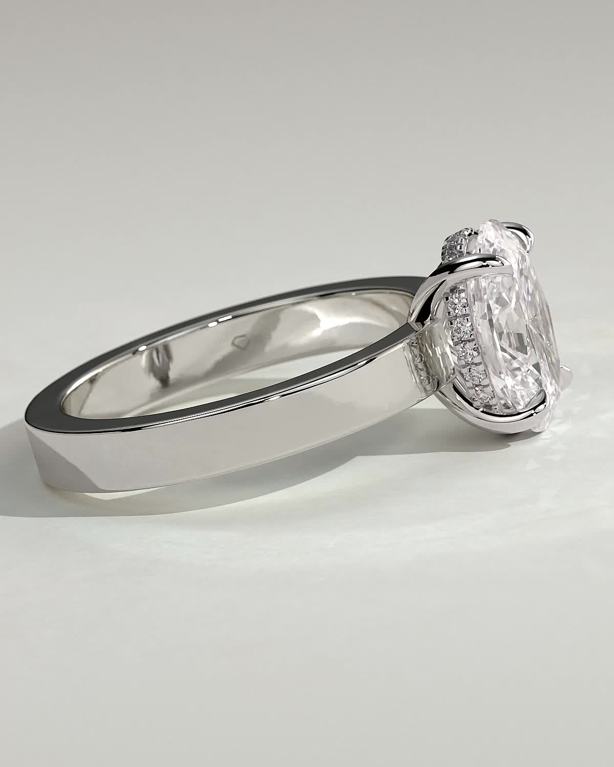 Nikita - Oval Flat Cigar Band Solitaire with Hidden Halo - 18k White Gold