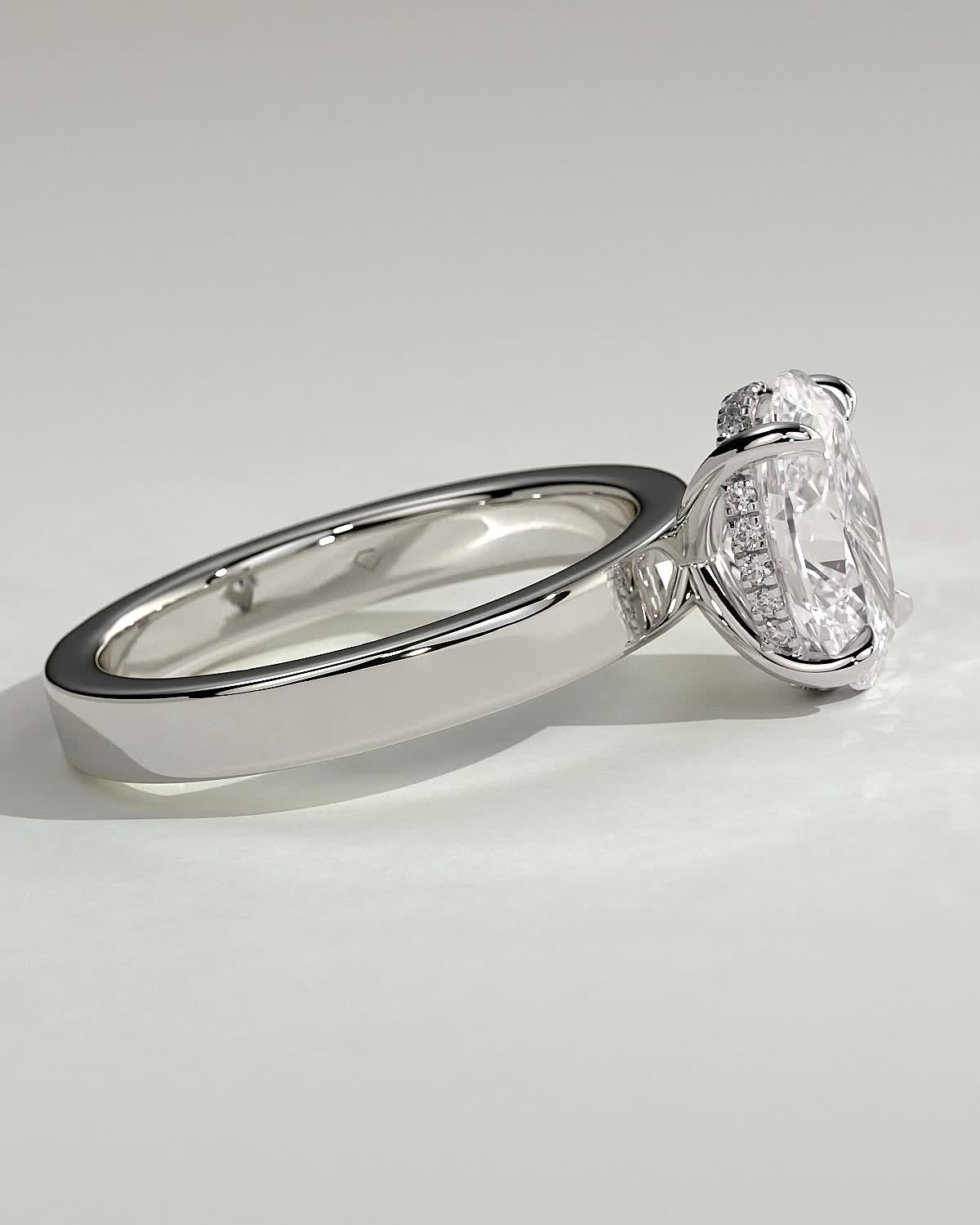 Nikita - Oval Flat Cigar Band Solitaire with Hidden Halo - 18k White Gold