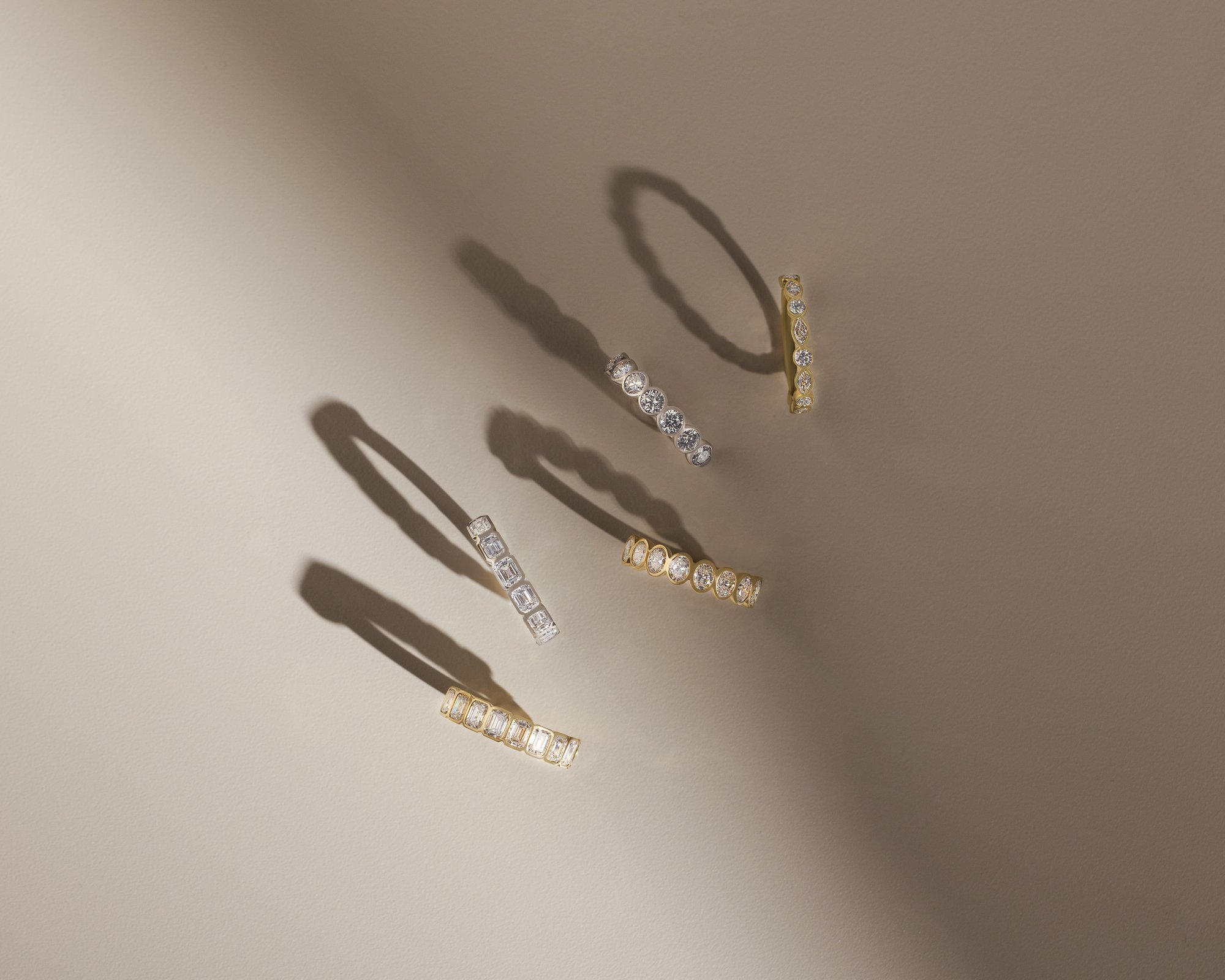 Nikki - Bezel Set Emerald Wedding Ring Lifestyle Image