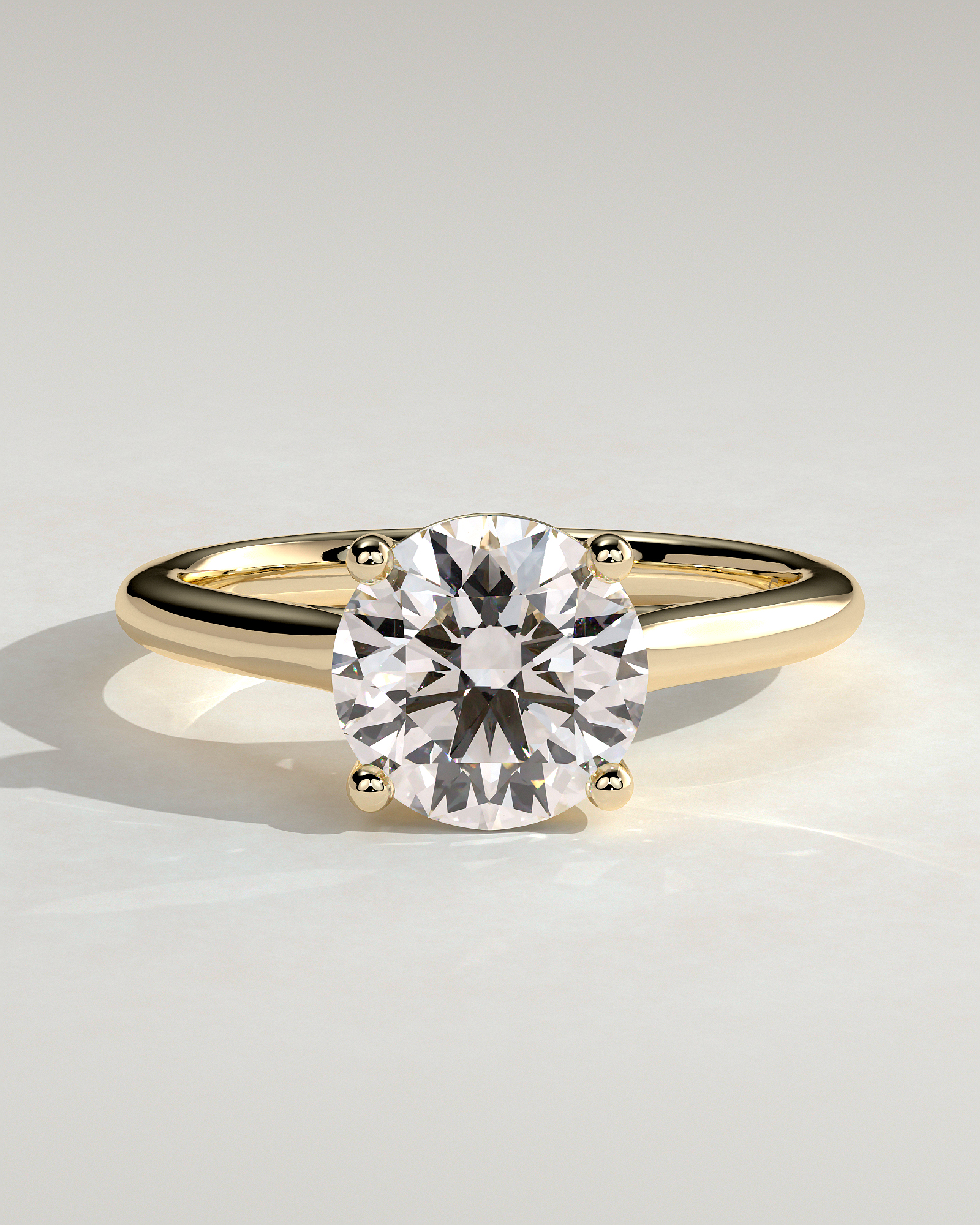 Noelle - 4 Claw Cathedral Round Solitaire - 18k Yellow Gold