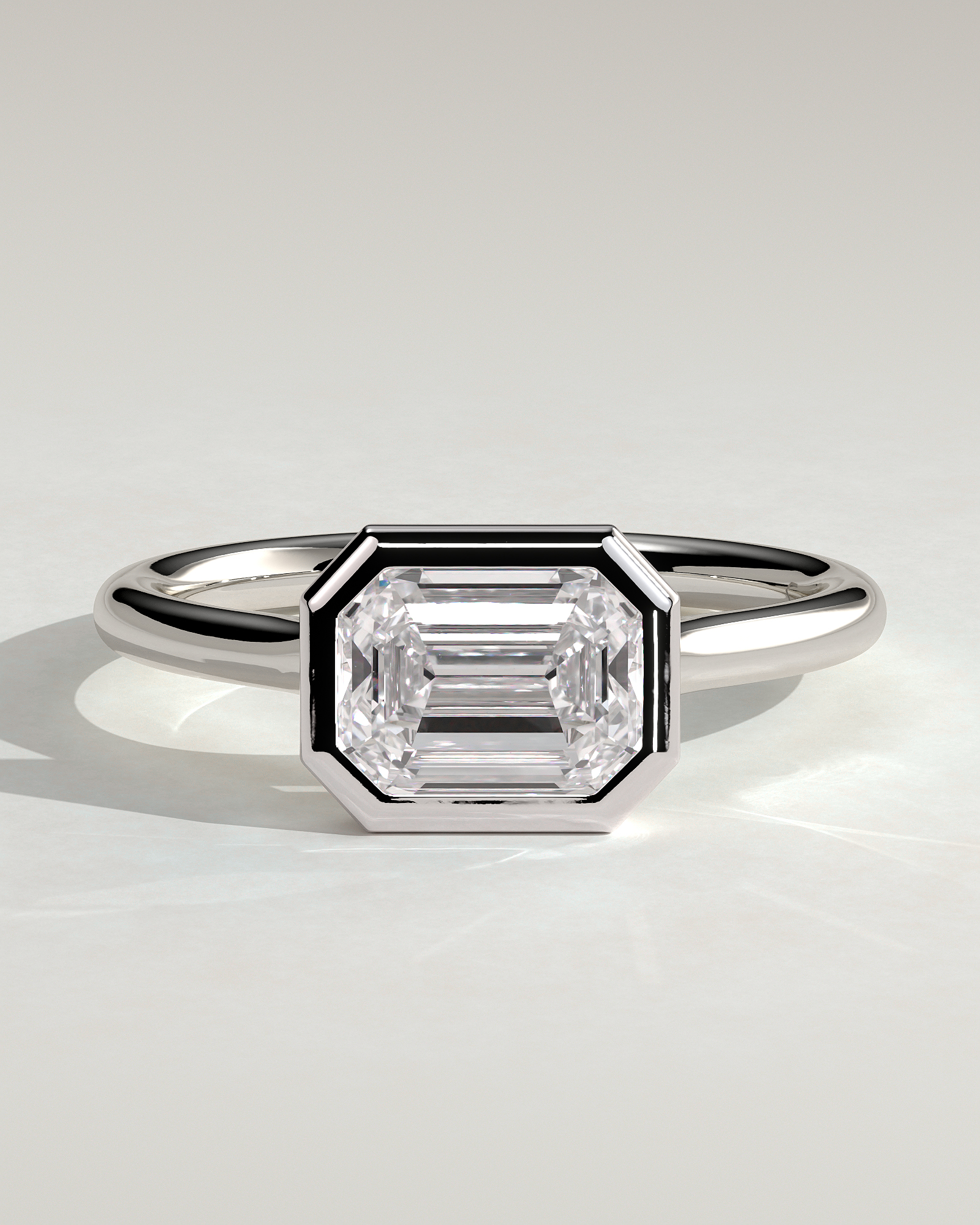 Olive - East West Emerald Solitaire with Cathedral Bezel Setting - 18k White Gold