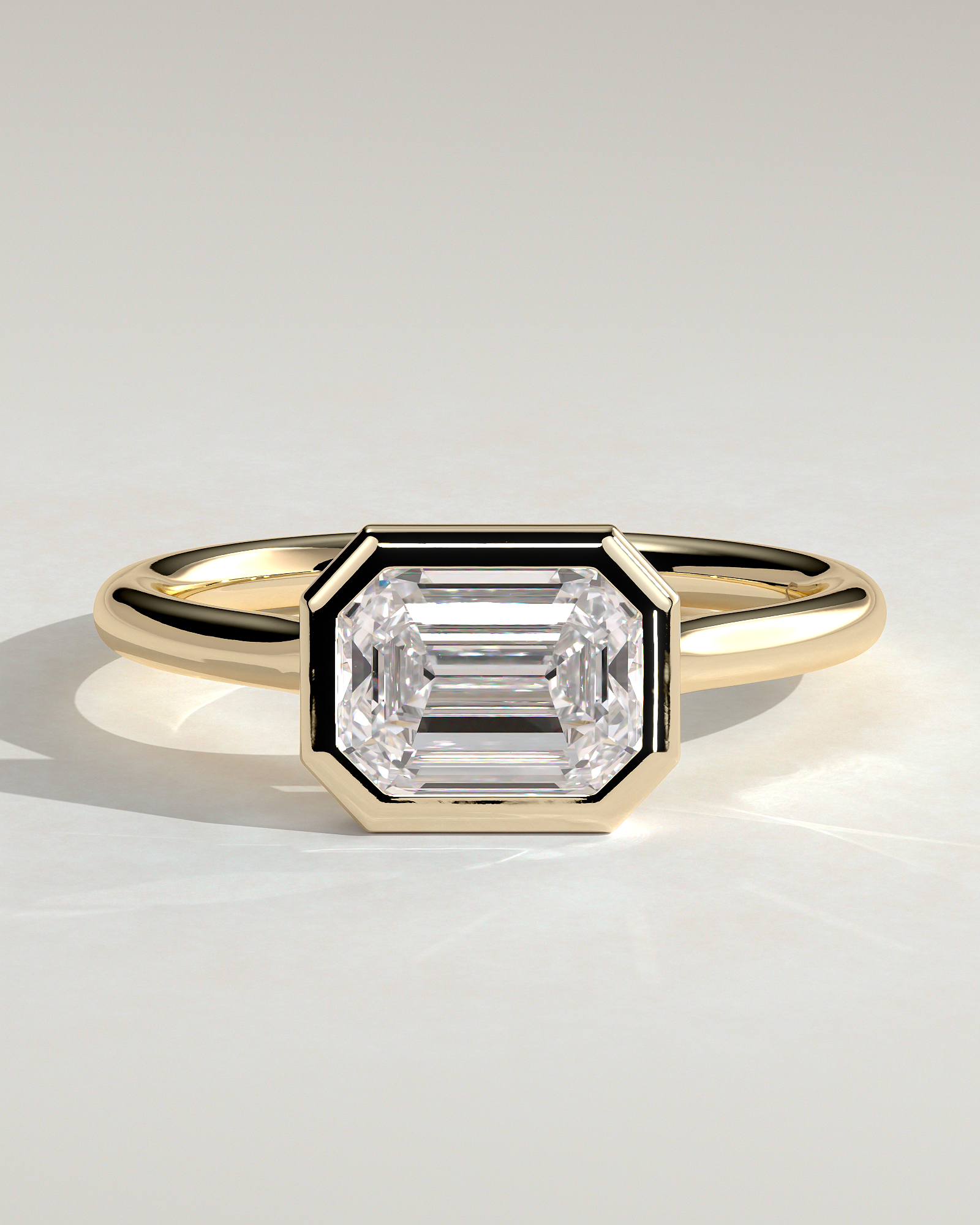 Olive - East West Emerald Solitaire with Cathedral Bezel Setting - 18k Yellow Gold