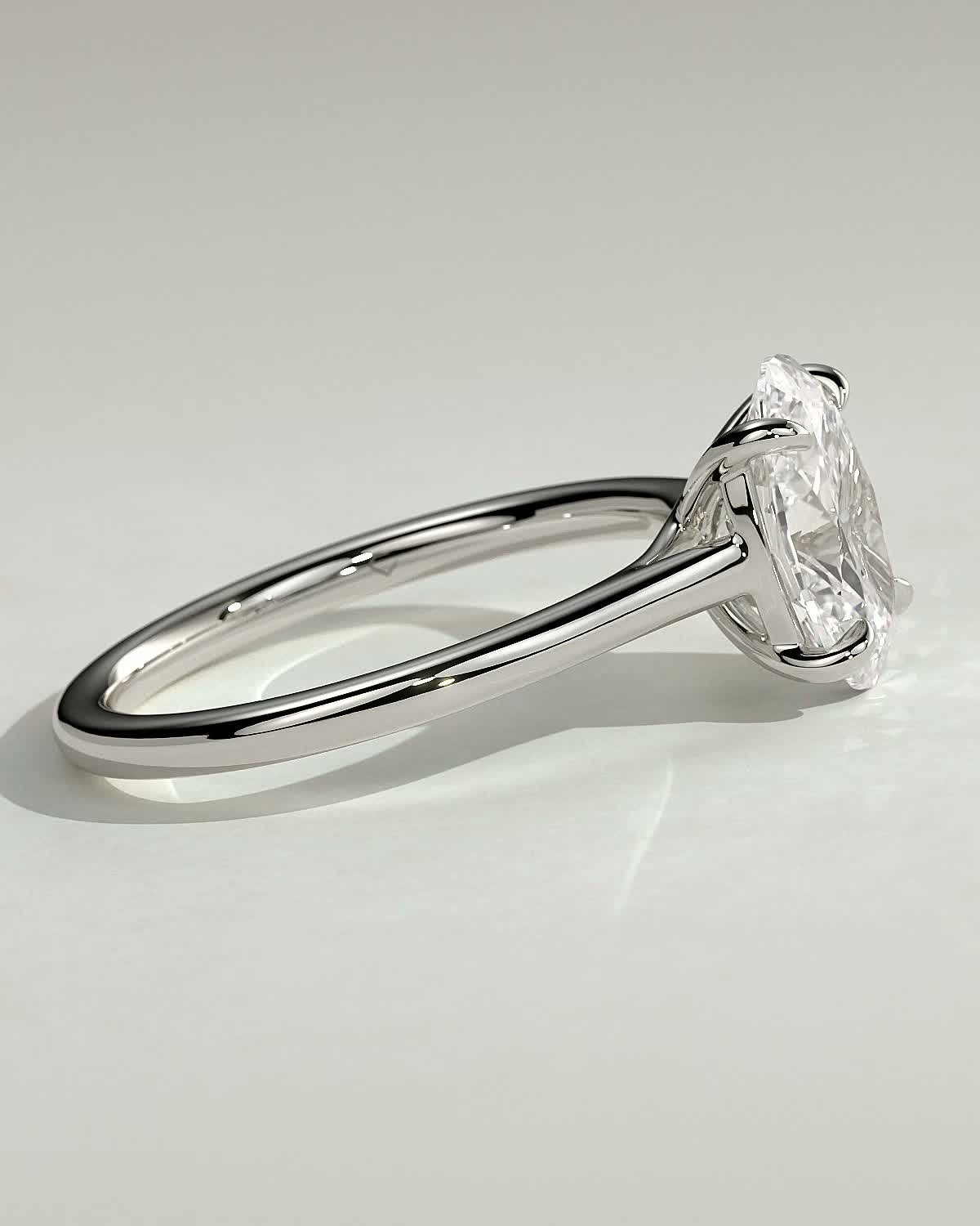 Olivia - Oval Solitaire with Trellis Setting - 18k White Gold