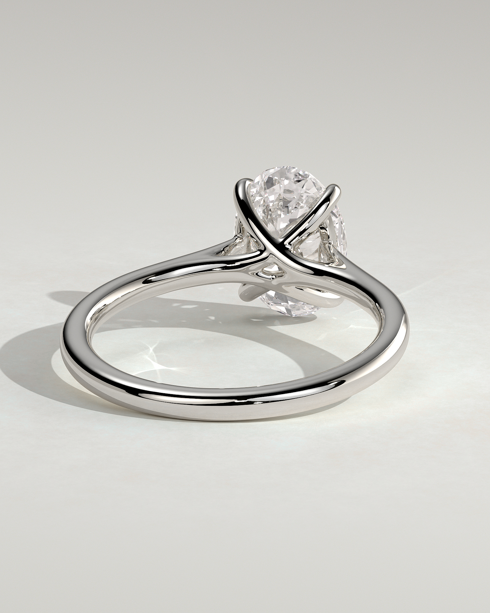 Olivia - Oval Solitaire with Trellis Setting - 18k White Gold