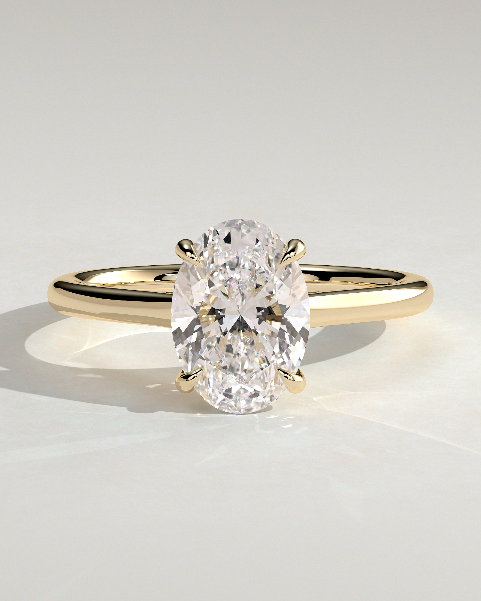 Olivia - Oval Solitaire with Trellis Setting - 18k Yellow Gold