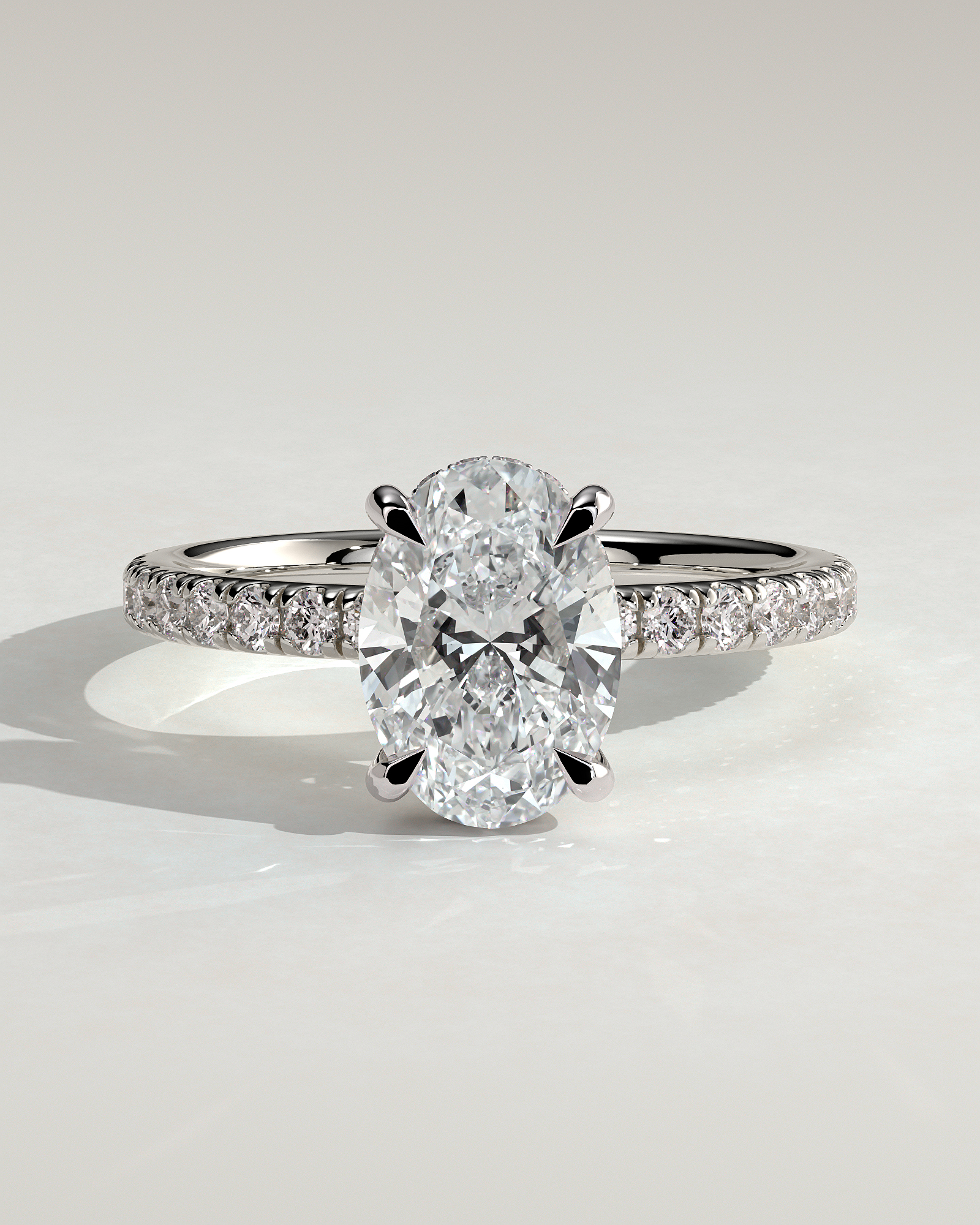 Paige - Oval 4 Claw Solitaire with Hidden Halo and Pave Band Engagement Ring - 18k White Gold