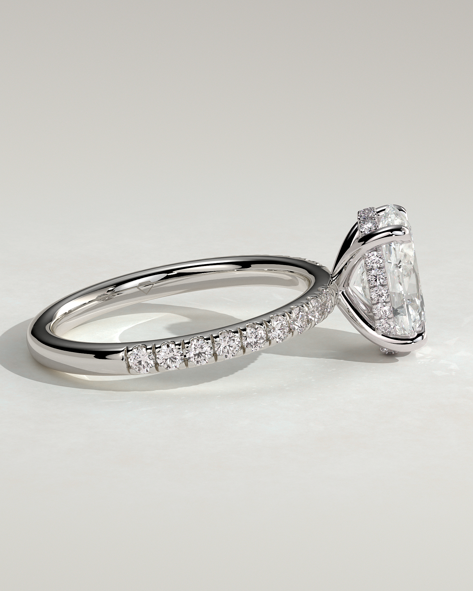 Paige - Oval 4 Claw Solitaire with Hidden Halo and Pave Band Engagement Ring - 18k White Gold