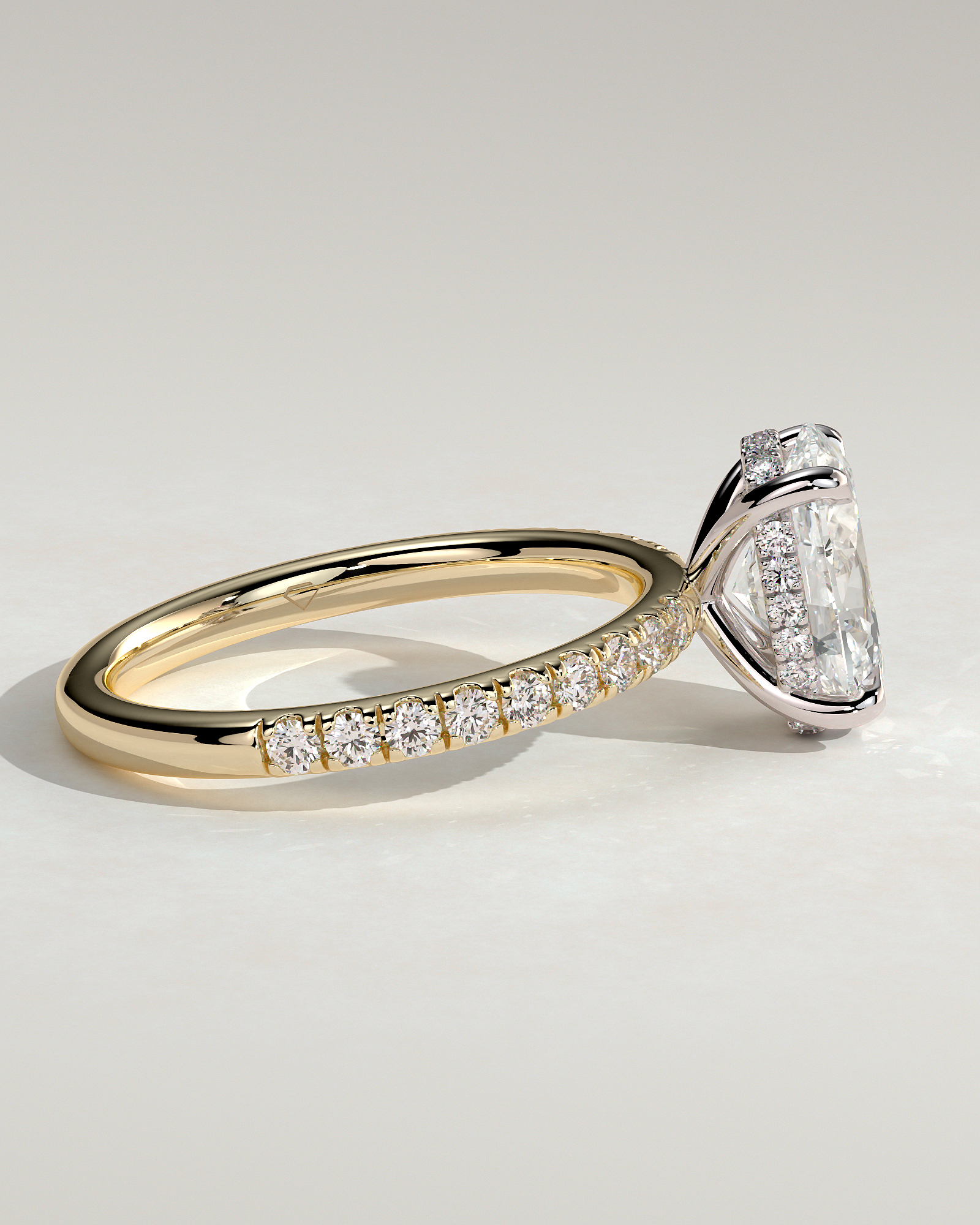 Paige - Oval 4 Claw Solitaire with Hidden Halo and Pave Band Engagement Ring - 18k Yellow Gold / 18k White Gold