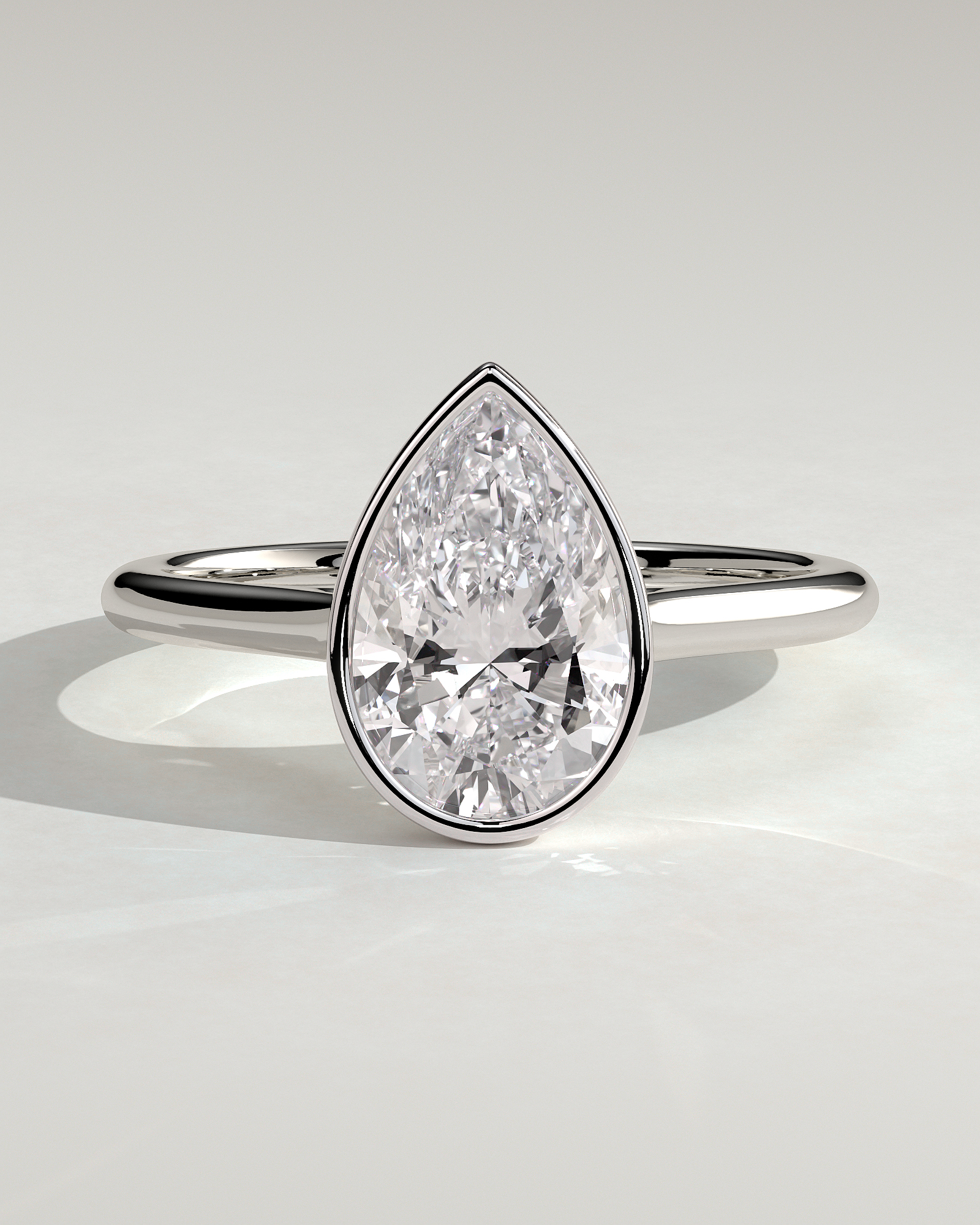 Paris - Pear Solitaire with Cathedral Bezel Setting - 18k White Gold