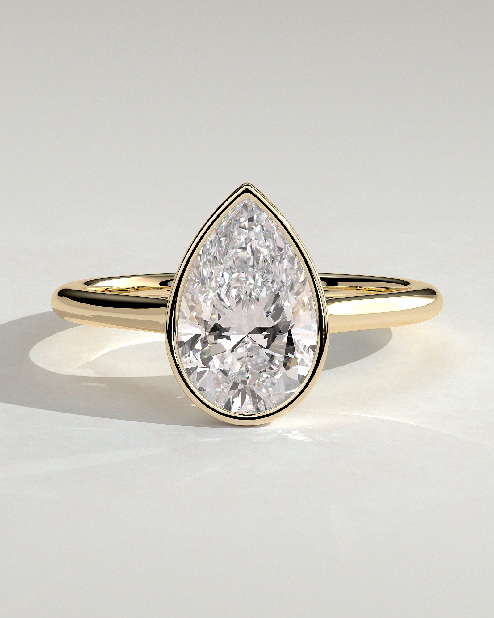 Paris - Pear Solitaire with Cathedral Bezel Setting - 18k Yellow Gold