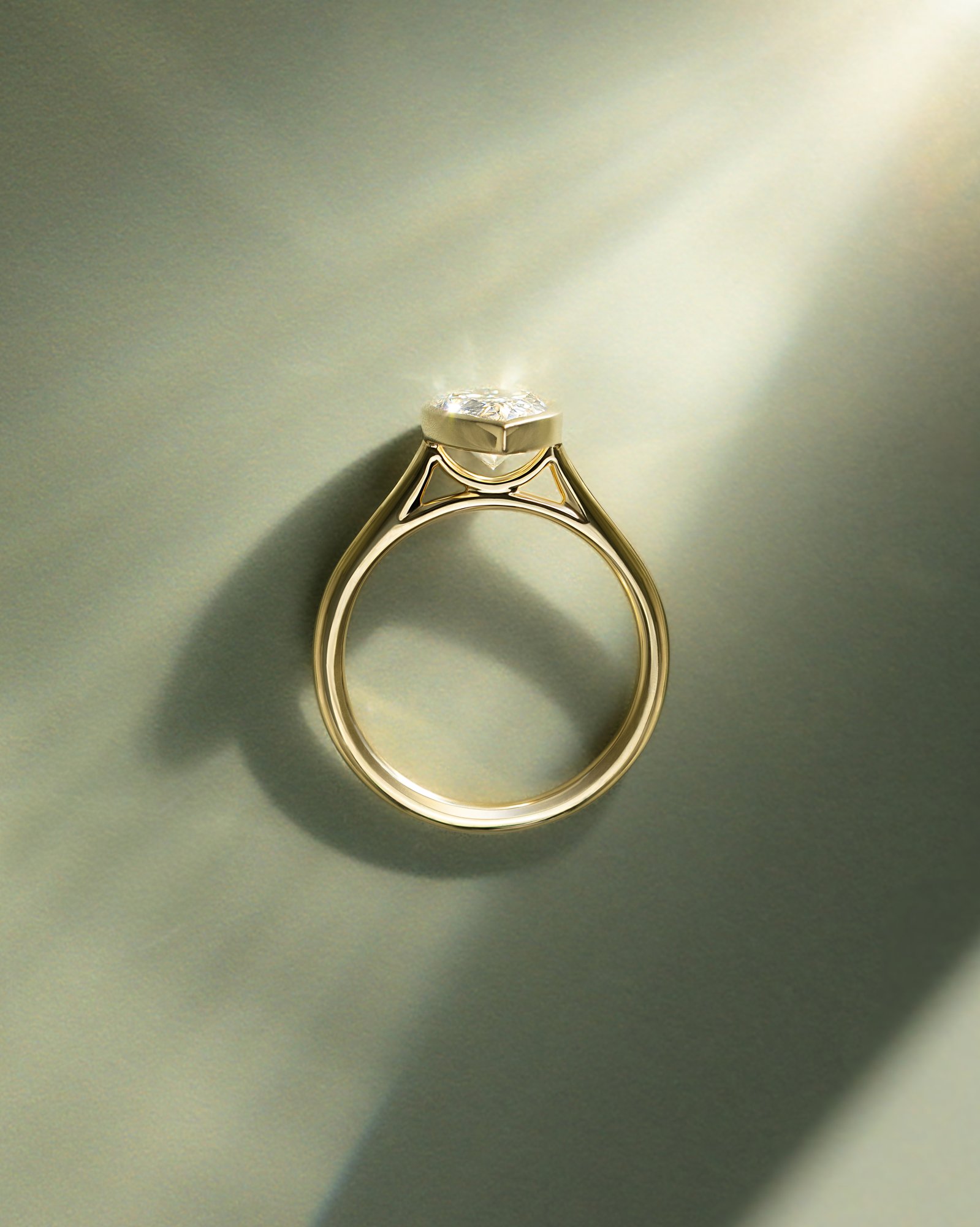 Paris - Pear Solitaire with Cathedral Bezel Setting Lifestyle Image