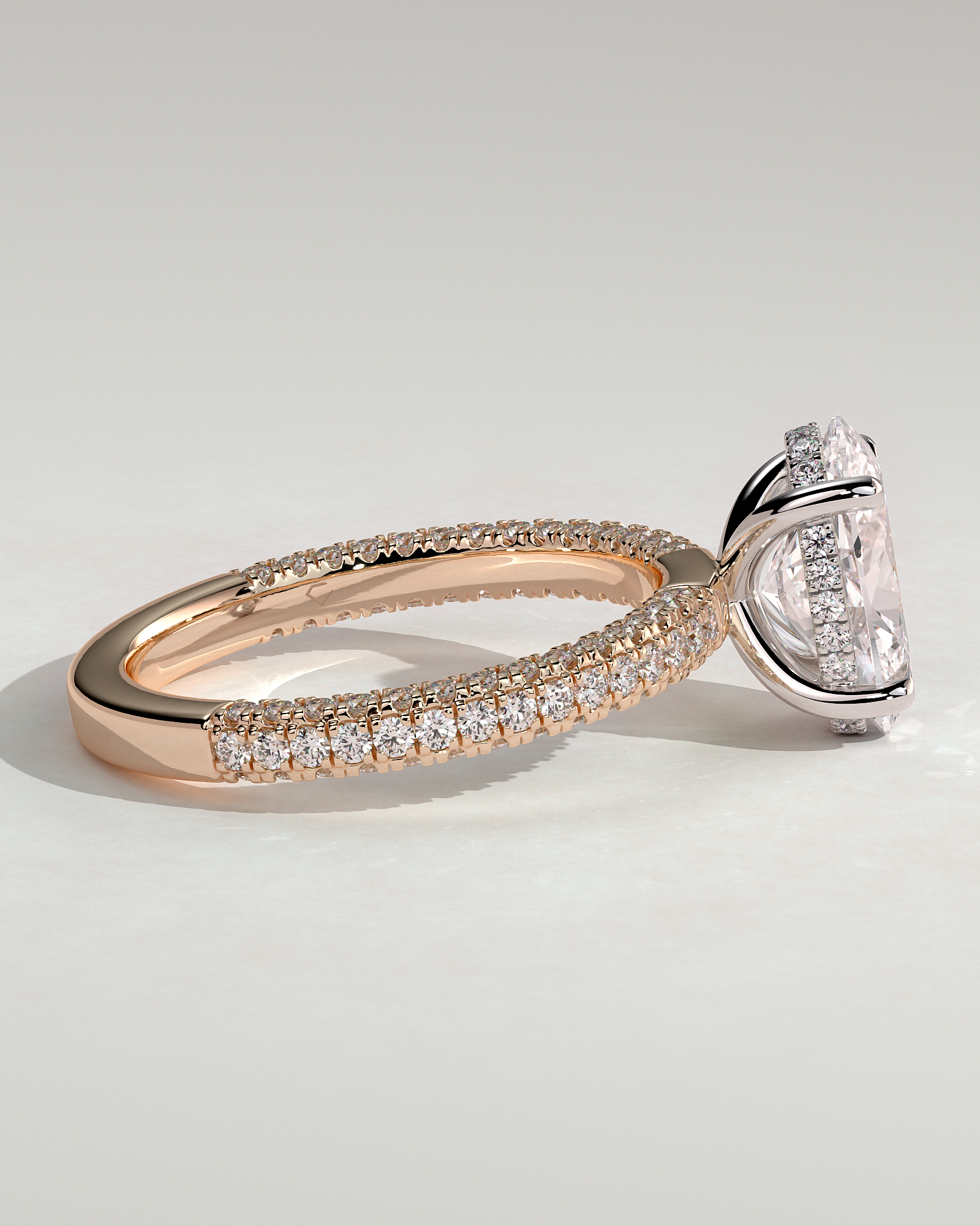 Penelope   Oval Solitaire with Hidden Halo and Triple Pav - 18k Rose Gold / 18k White Gold